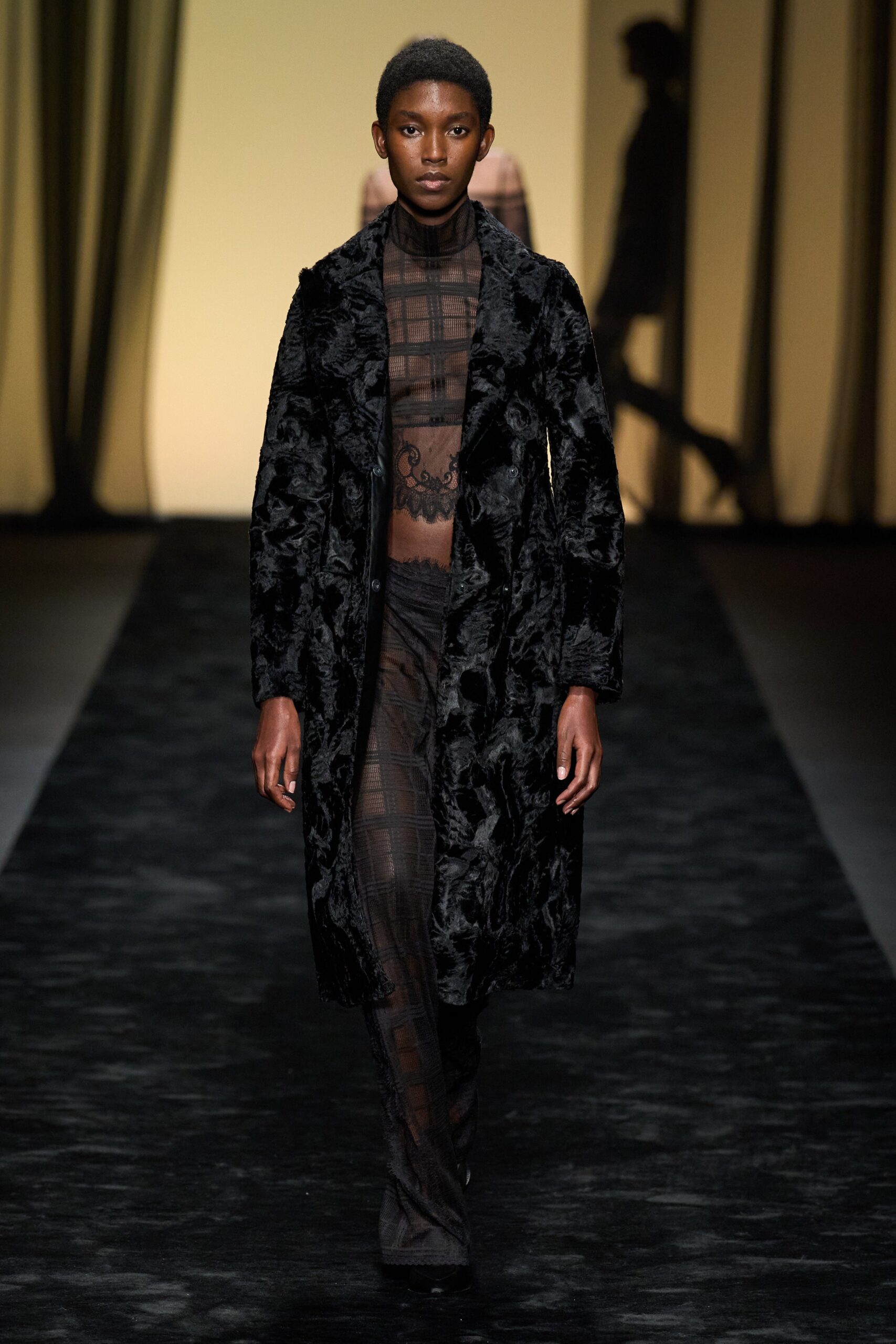 black faux-fur coat with lace top
