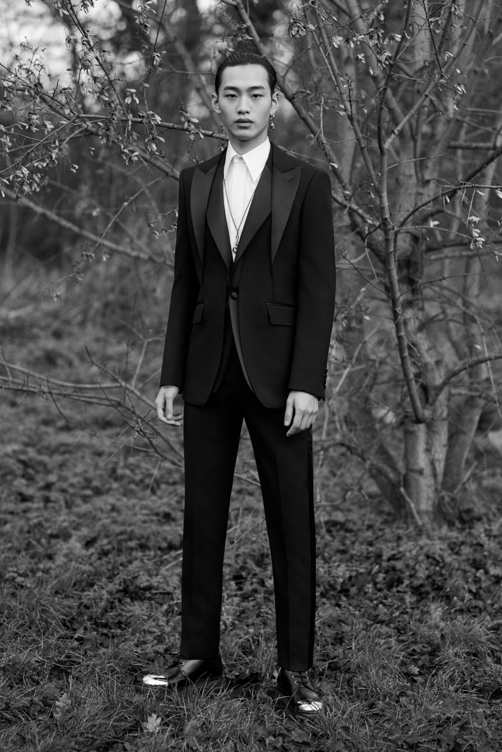black tailored suit with white shirt