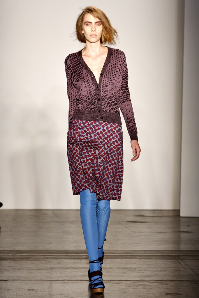 purple knit cardigan with printed skirt