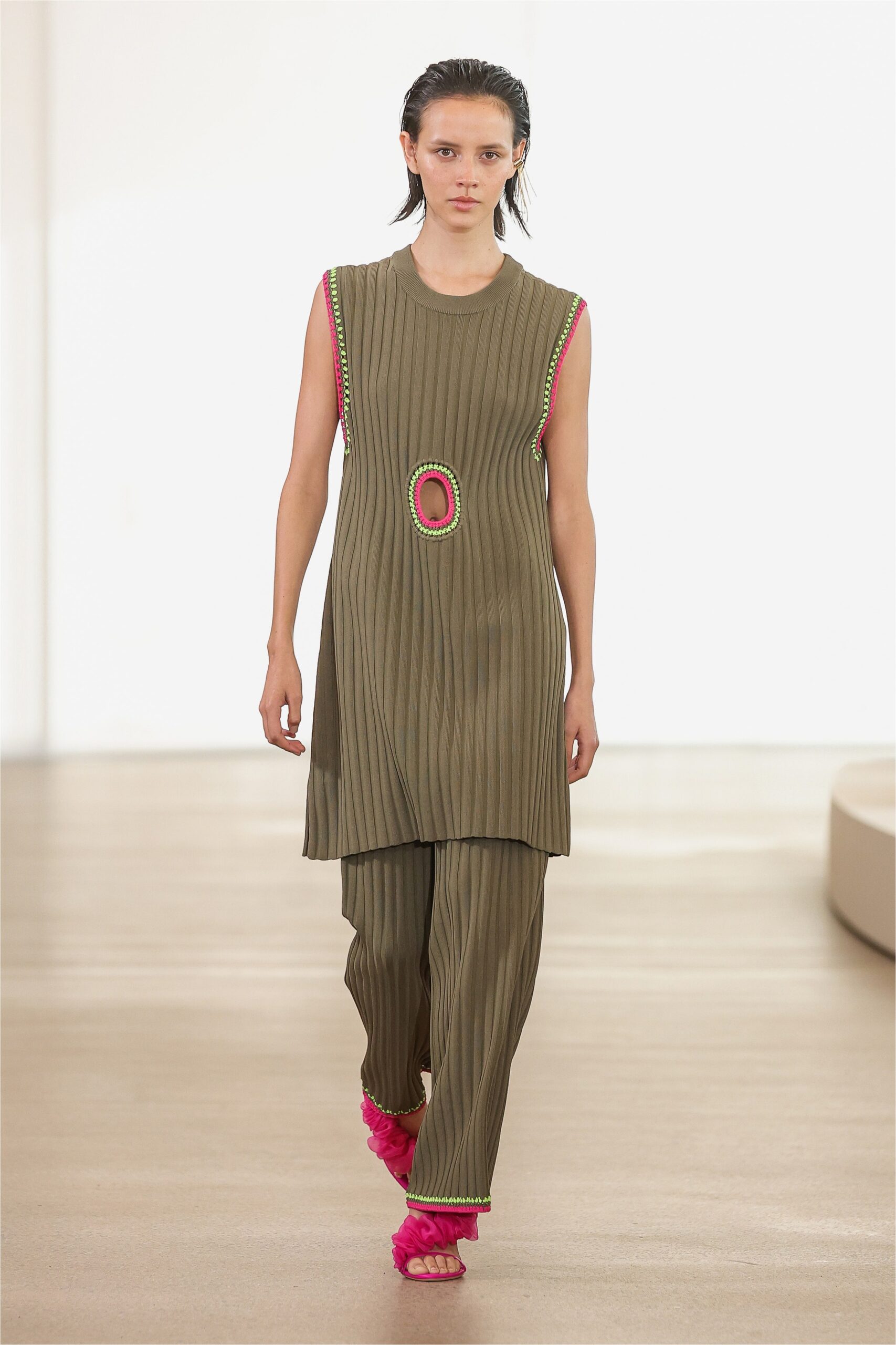 green cotton sleeveless high-neck relaxed pleated top