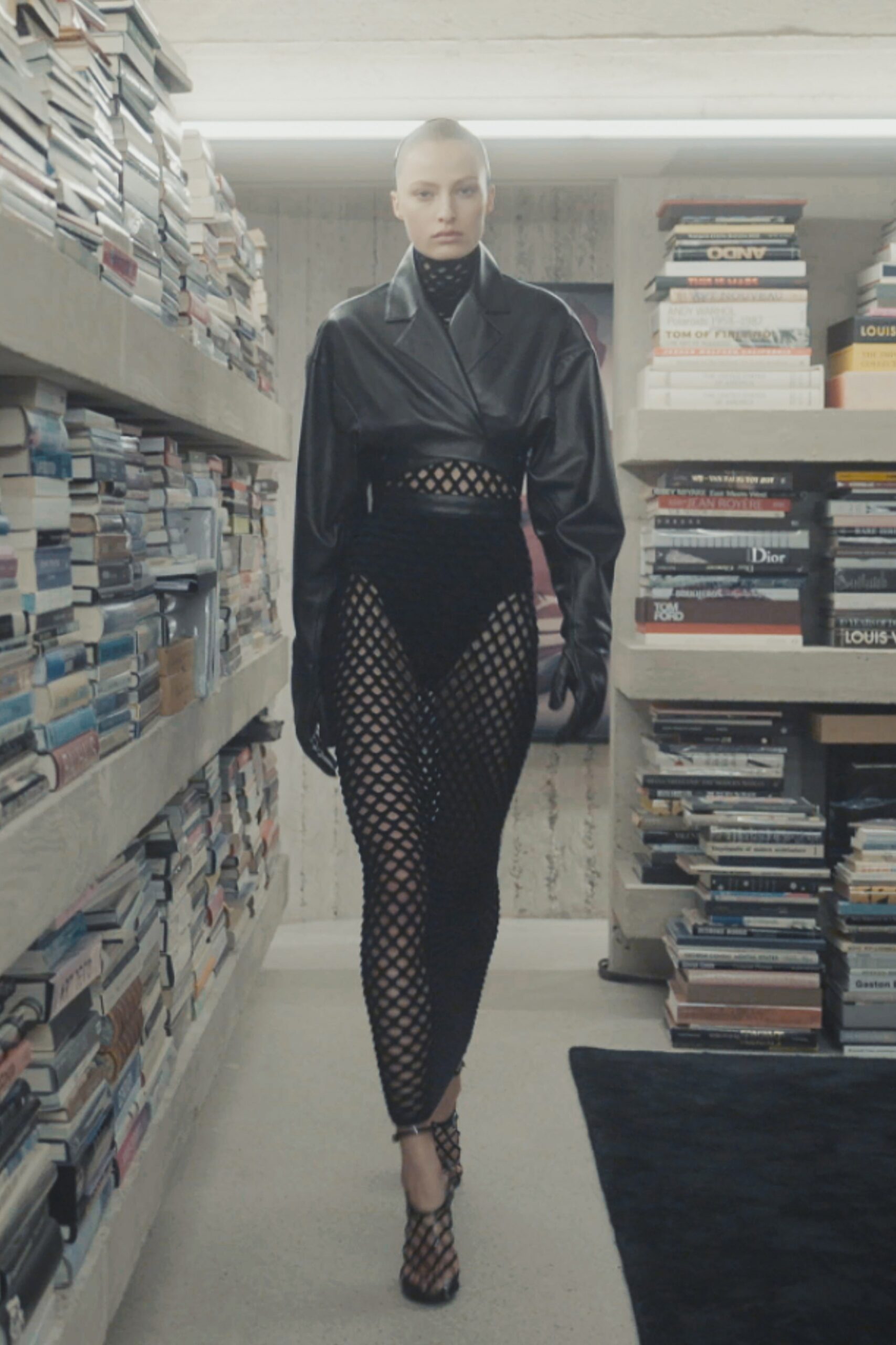 black leather fitted top with mesh pants