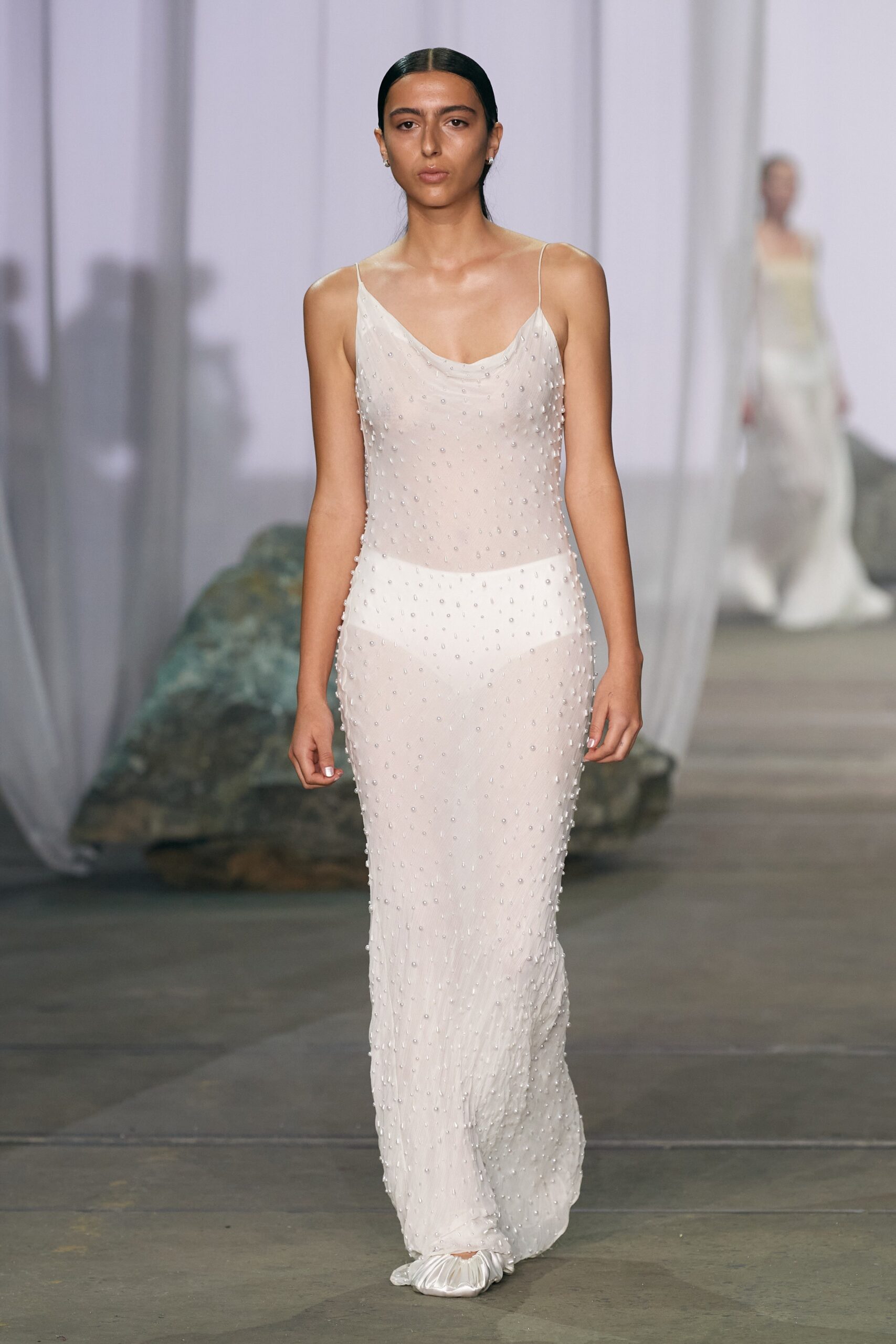 white beaded sleeveless gown