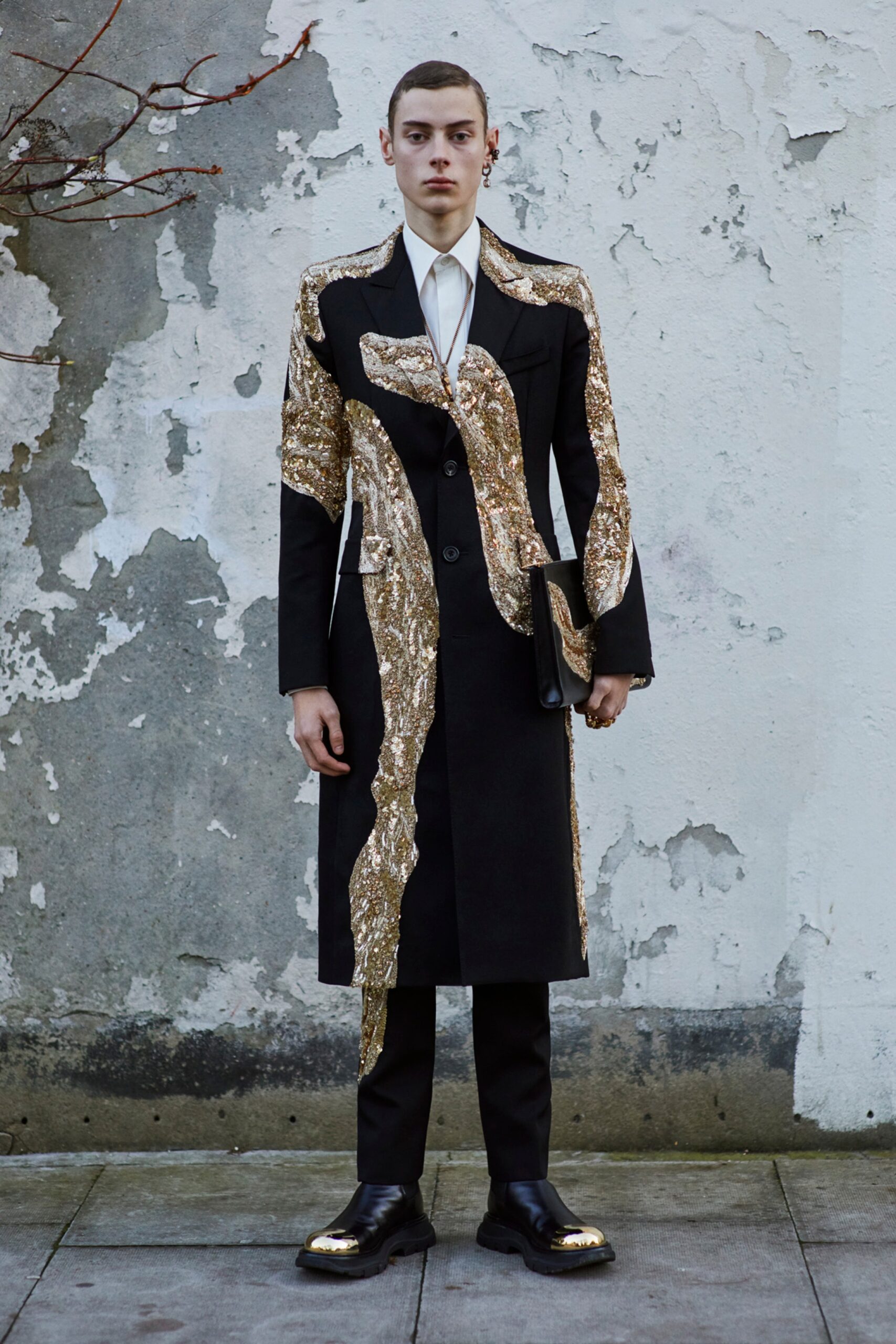 black wool coat with gold embroidery