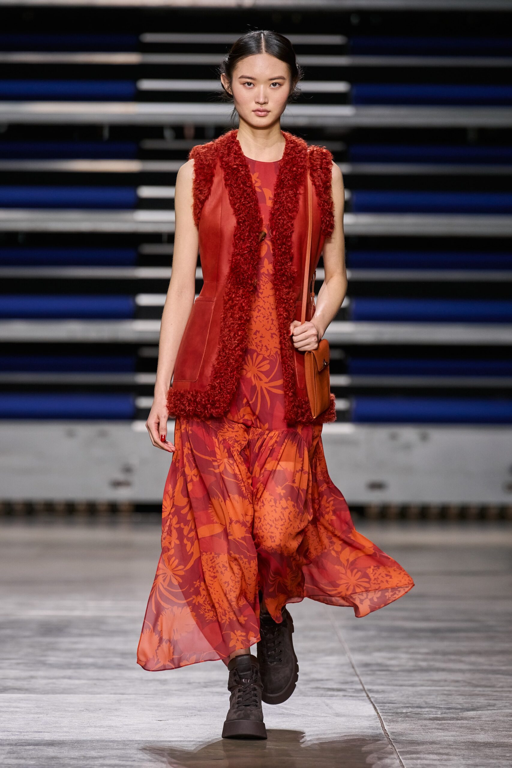 red floral maxi dress with faux-fur vest