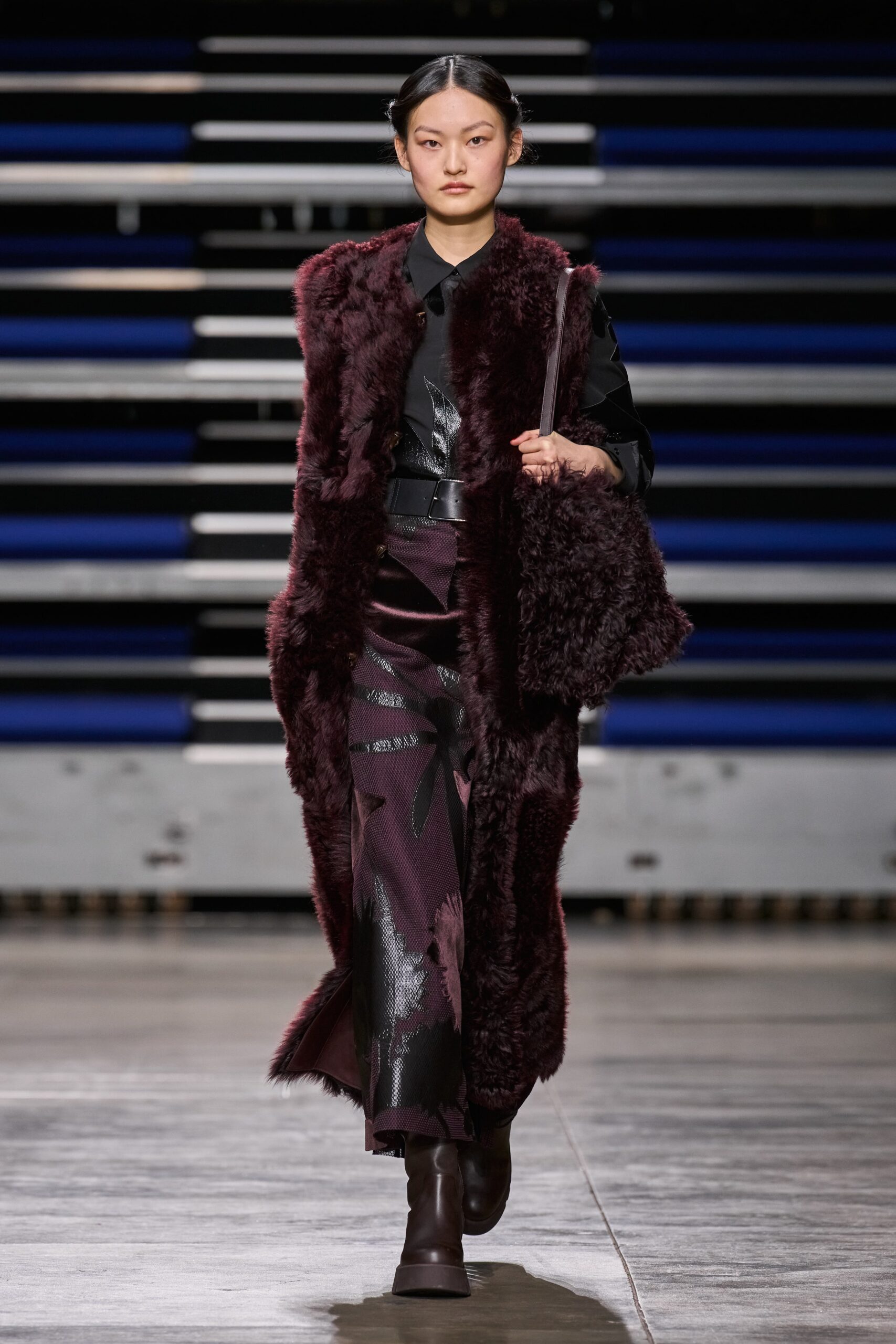 burgundy faux-fur coat and purple silk dress