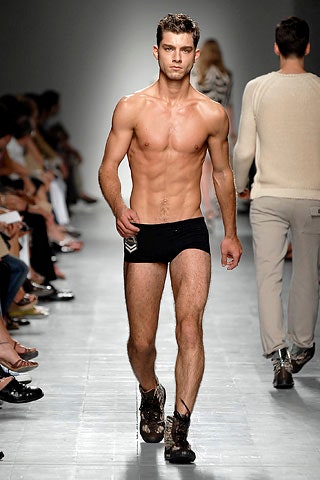black fitted swimsuit with brown shoes