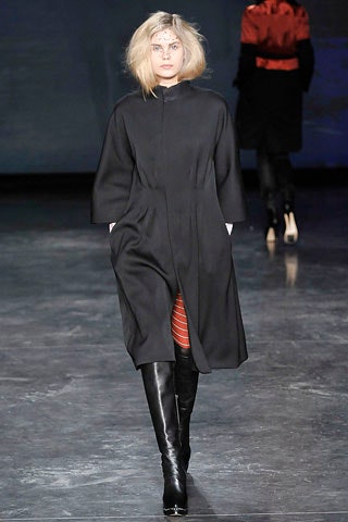 black wool relaxed coat and boots