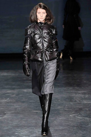 black vinyl fitted jacket with gray skirt