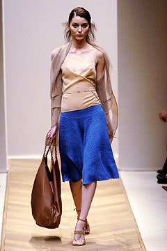 beige silk top with blue skirt