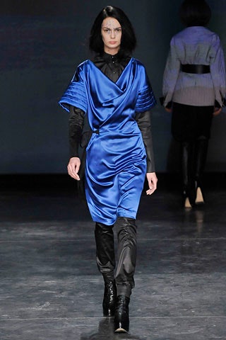 blue silk fitted mini dress with black shirt