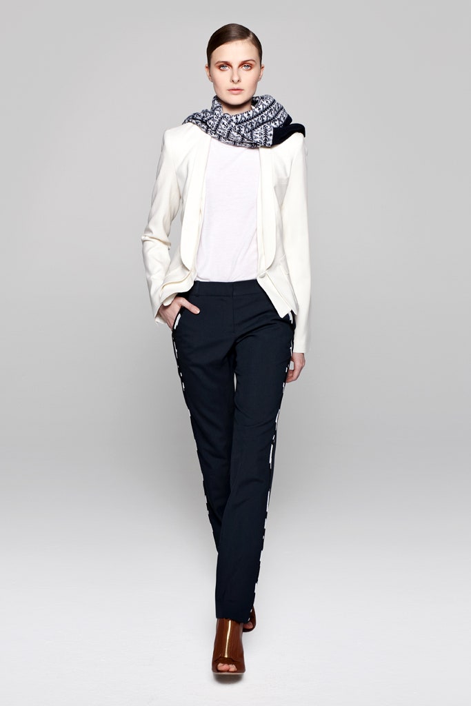white tailored blazer with black pants