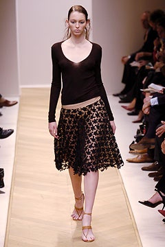 black fitted top and lace skirt