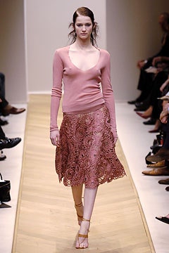 pink fitted top and lace skirt