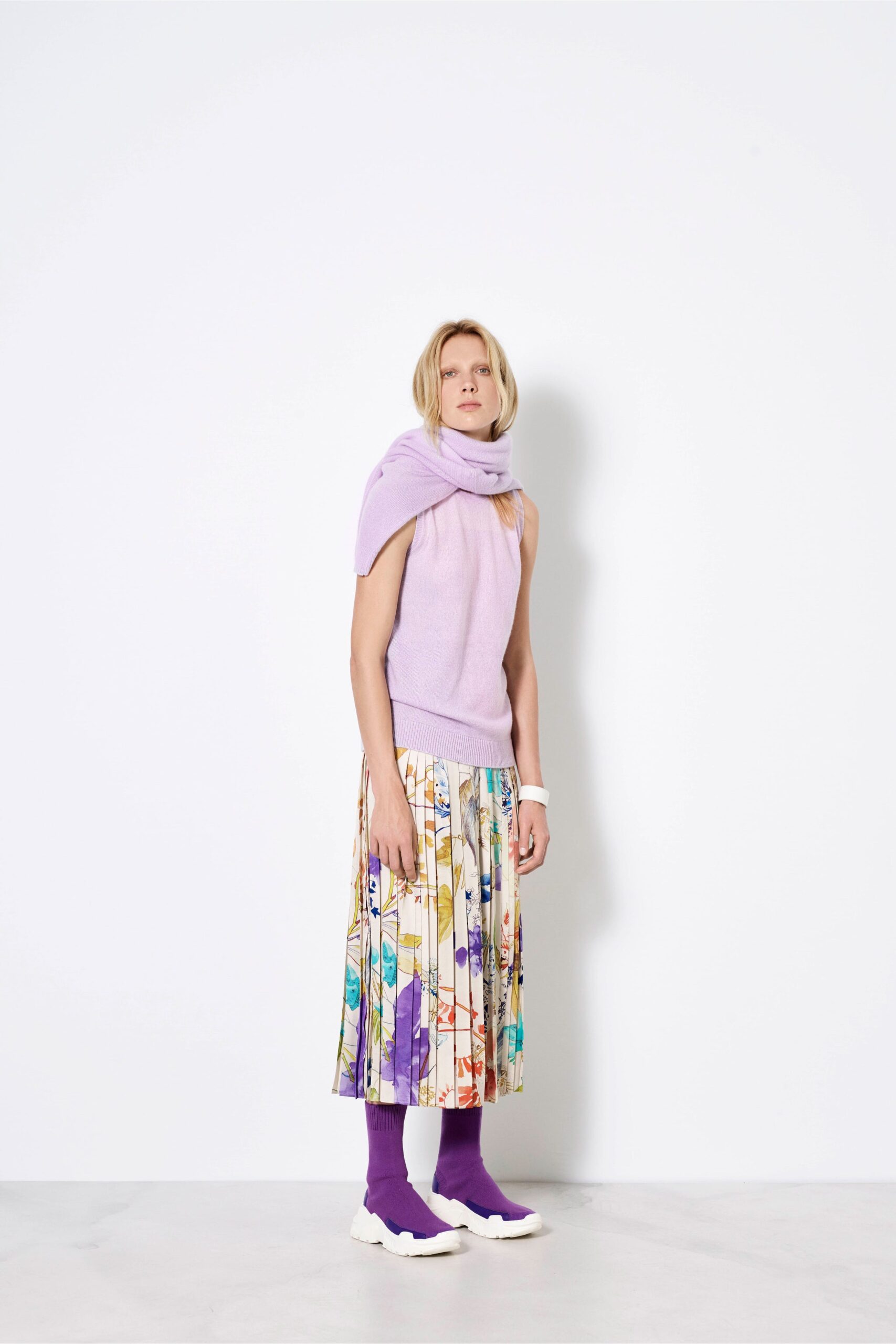 purple top with pleated skirt