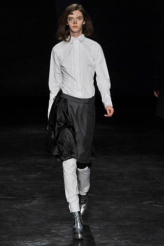 white fitted shirt with black pleated skirt