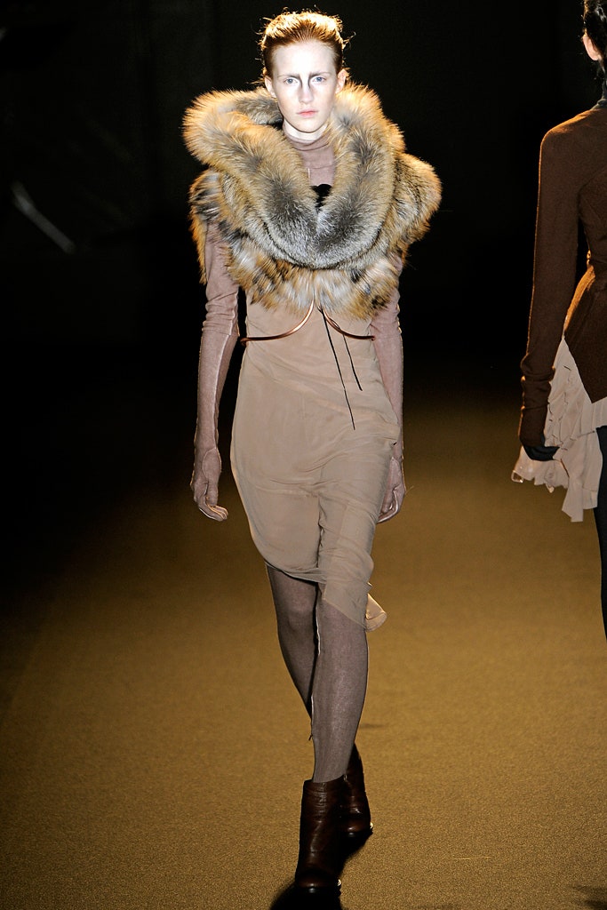 beige silk fitted dress with brown fur cape