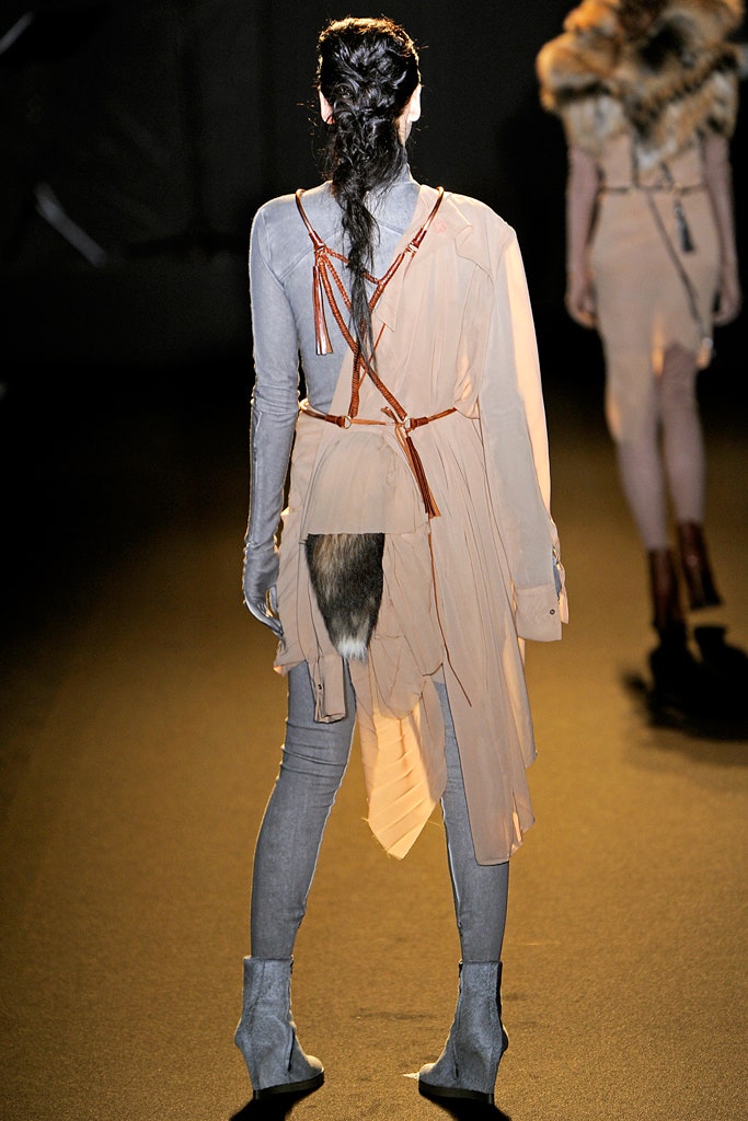 beige asymmetric dress with gray pants