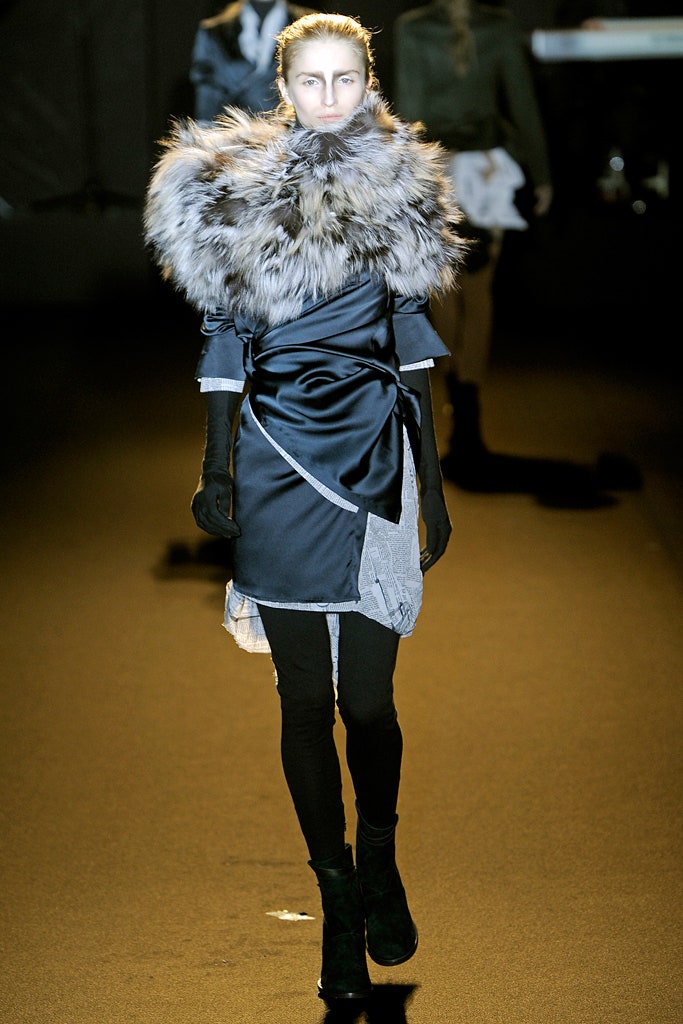 blue silk fitted dress with gray fur cape