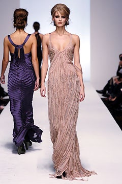 purple silk sleeveless v-neck fitted pleated flowing gown
