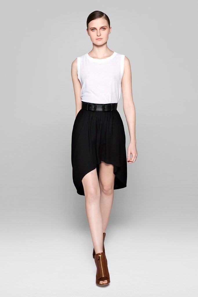 white fitted top with black skirt