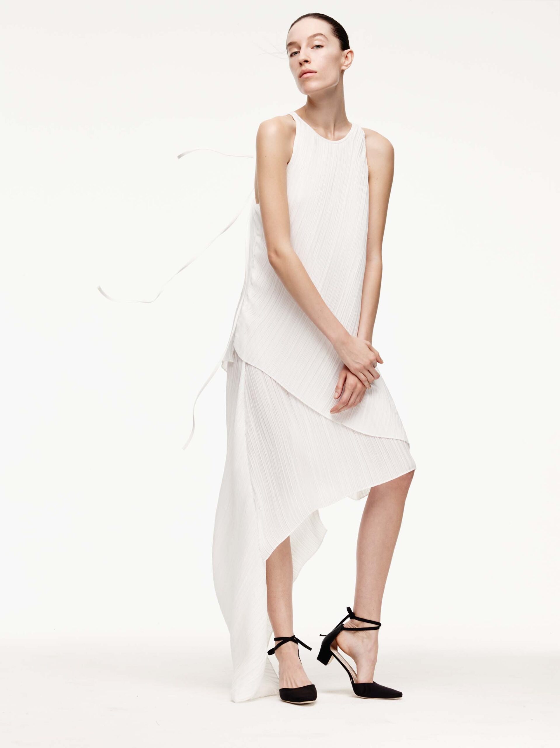 white silk sleeveless asymmetric dress