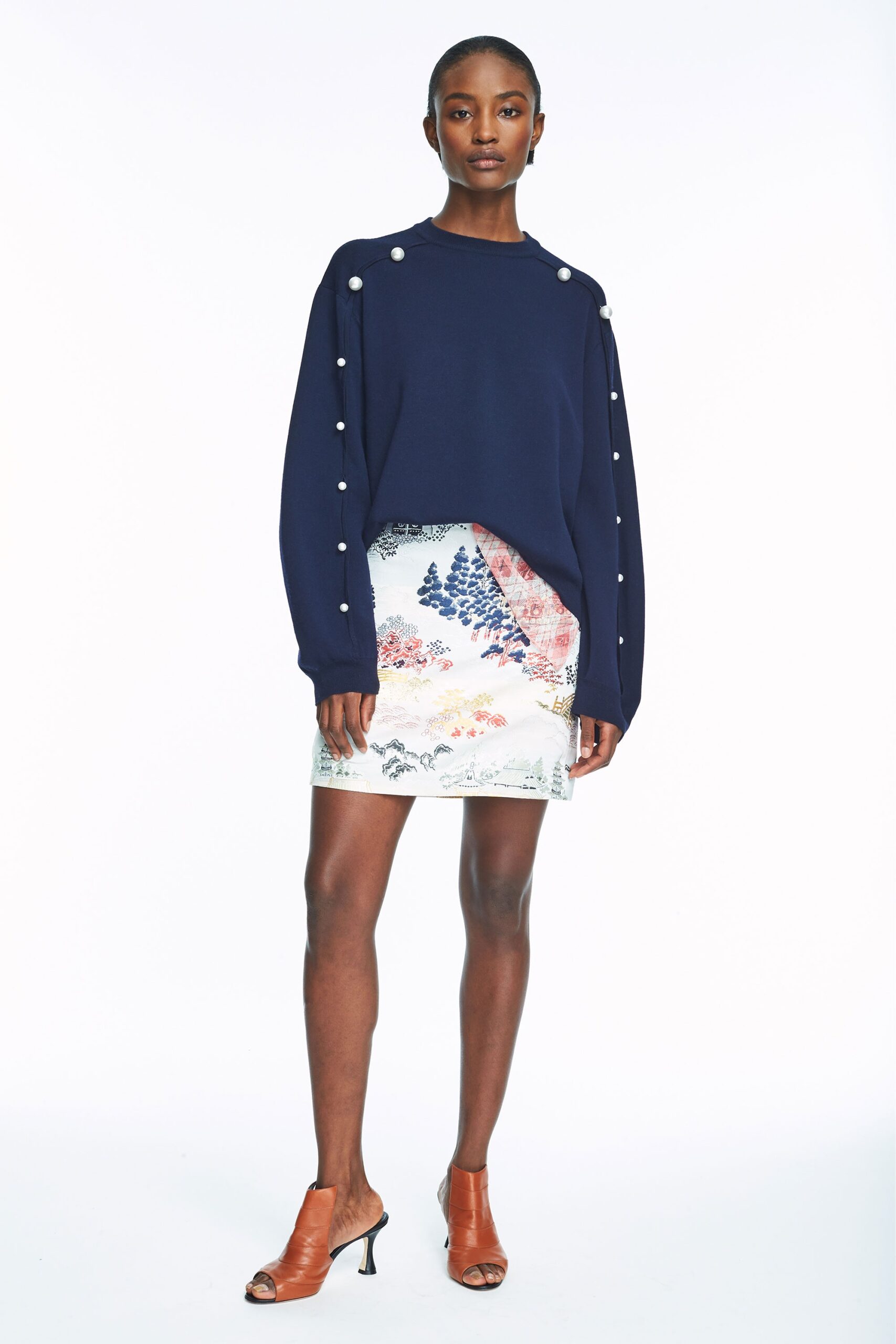 blue cotton long-sleeve collared relaxed beaded sweater