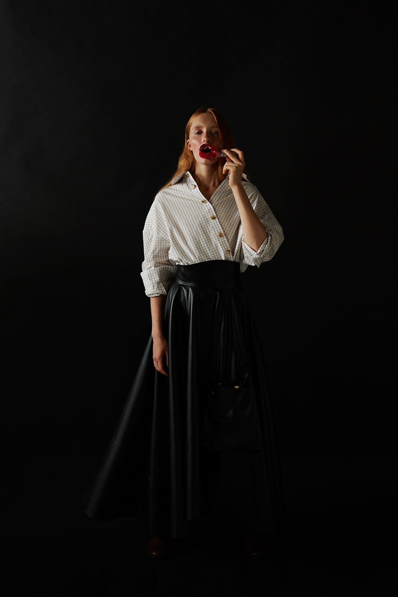 white cotton shirt and black leather skirt