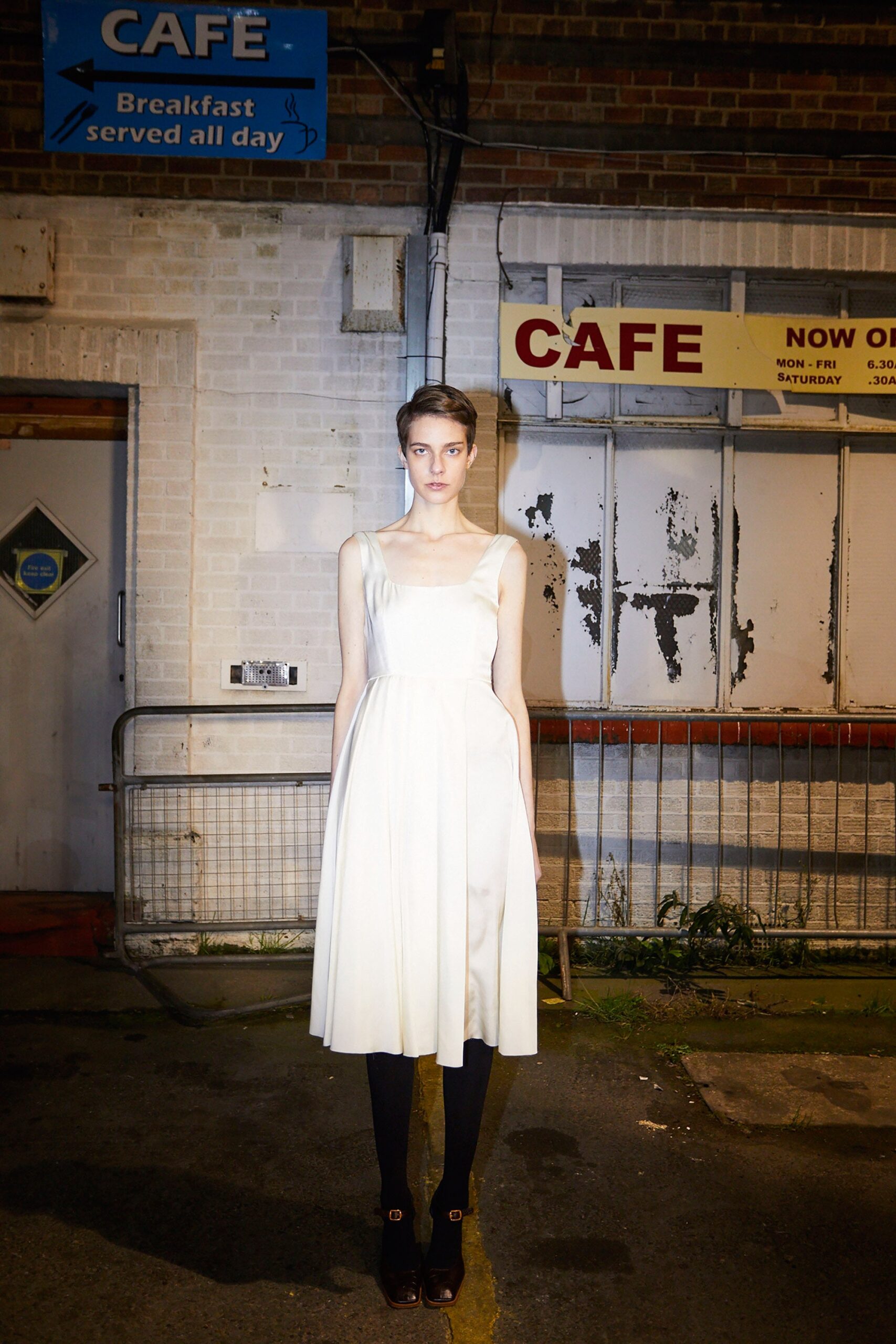 white silk sleeveless dress