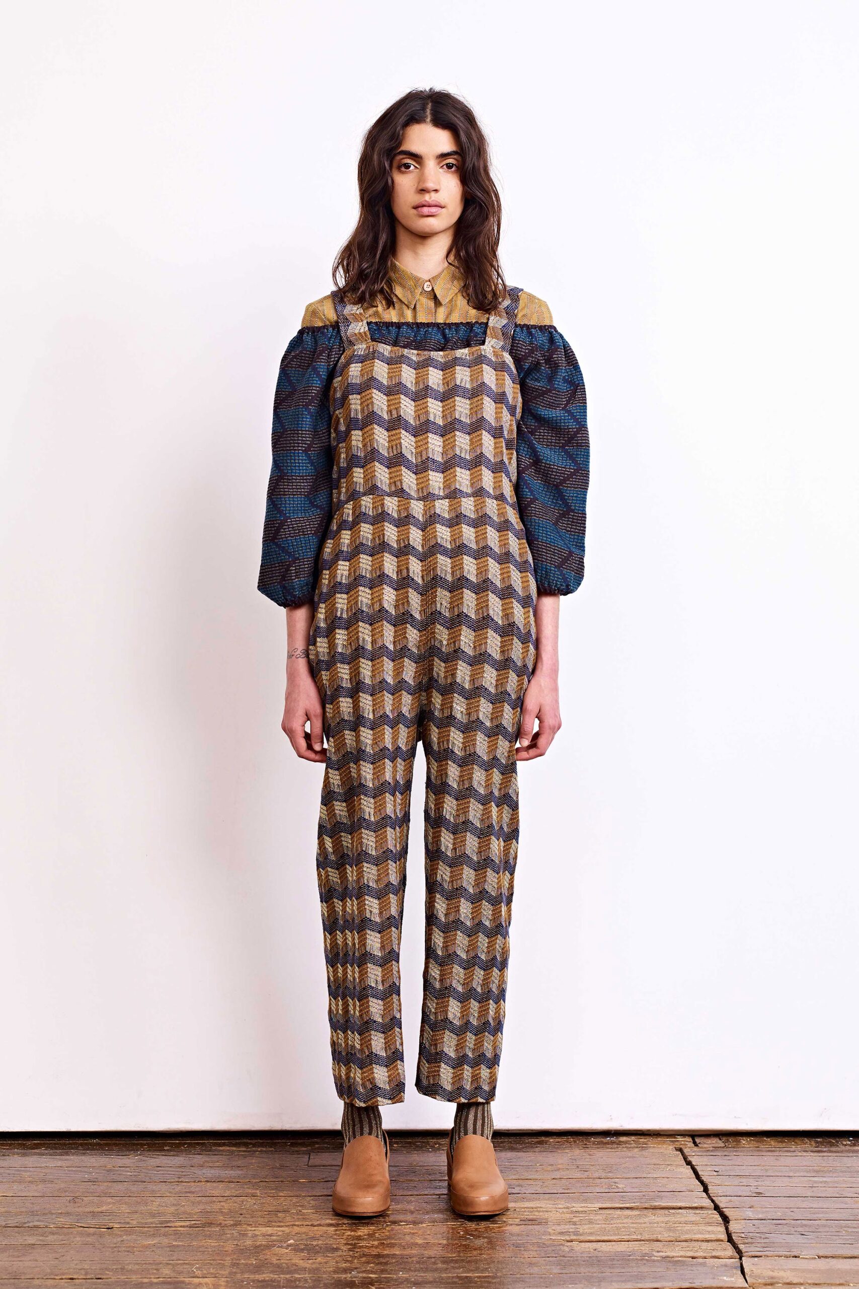 checked overalls with puffed blouse