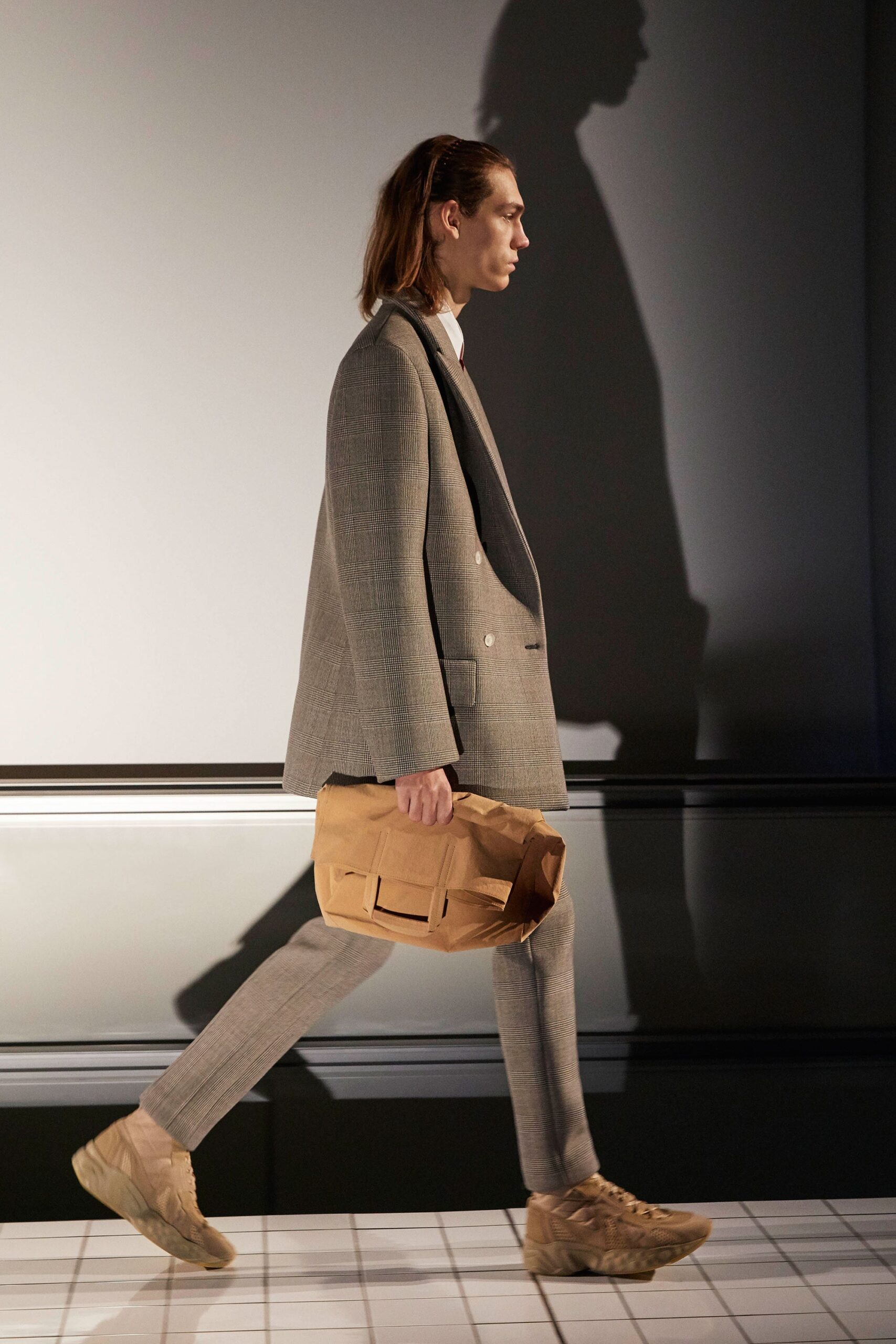 gray tailored suit with beige shoes