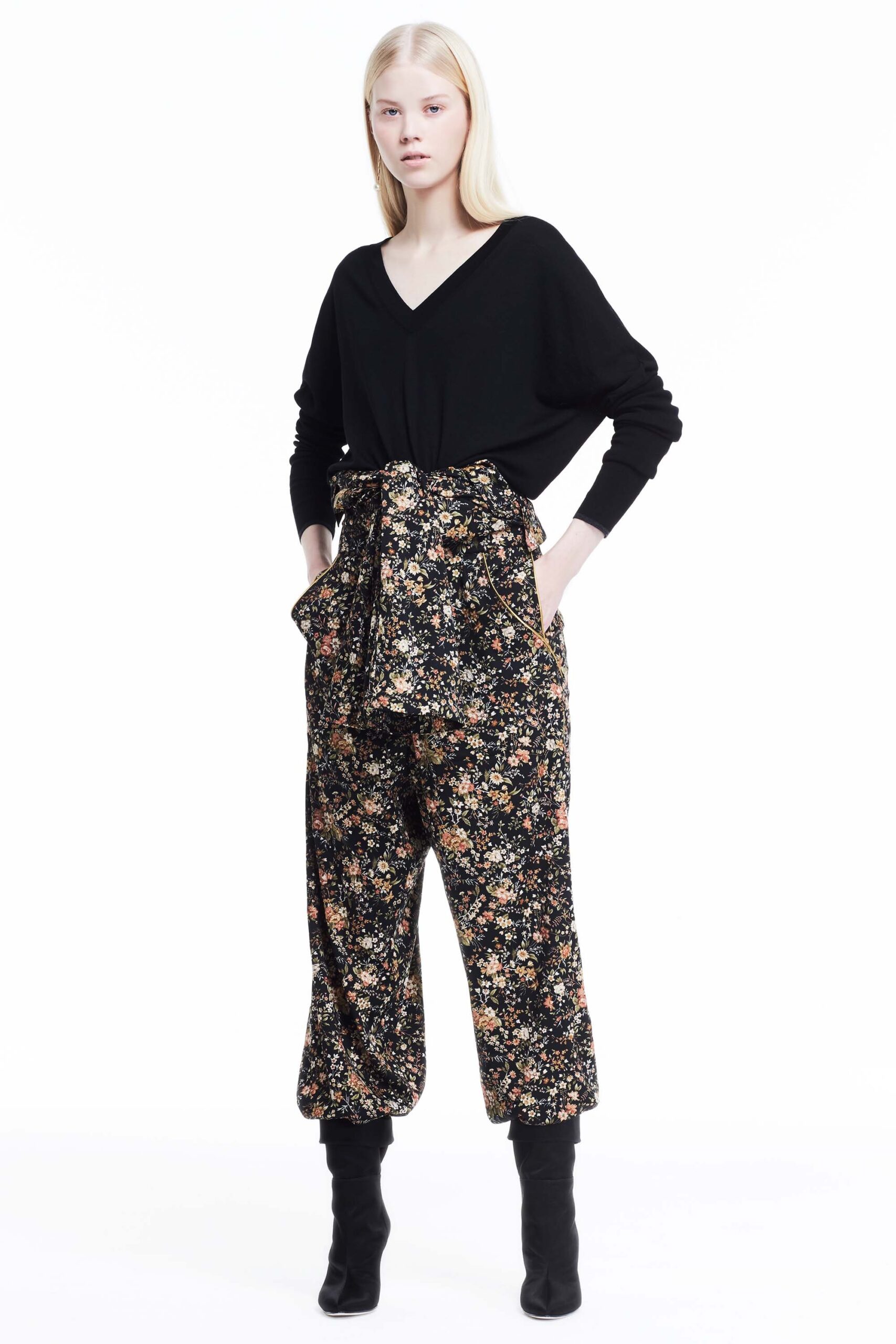 black relaxed top and flared pants