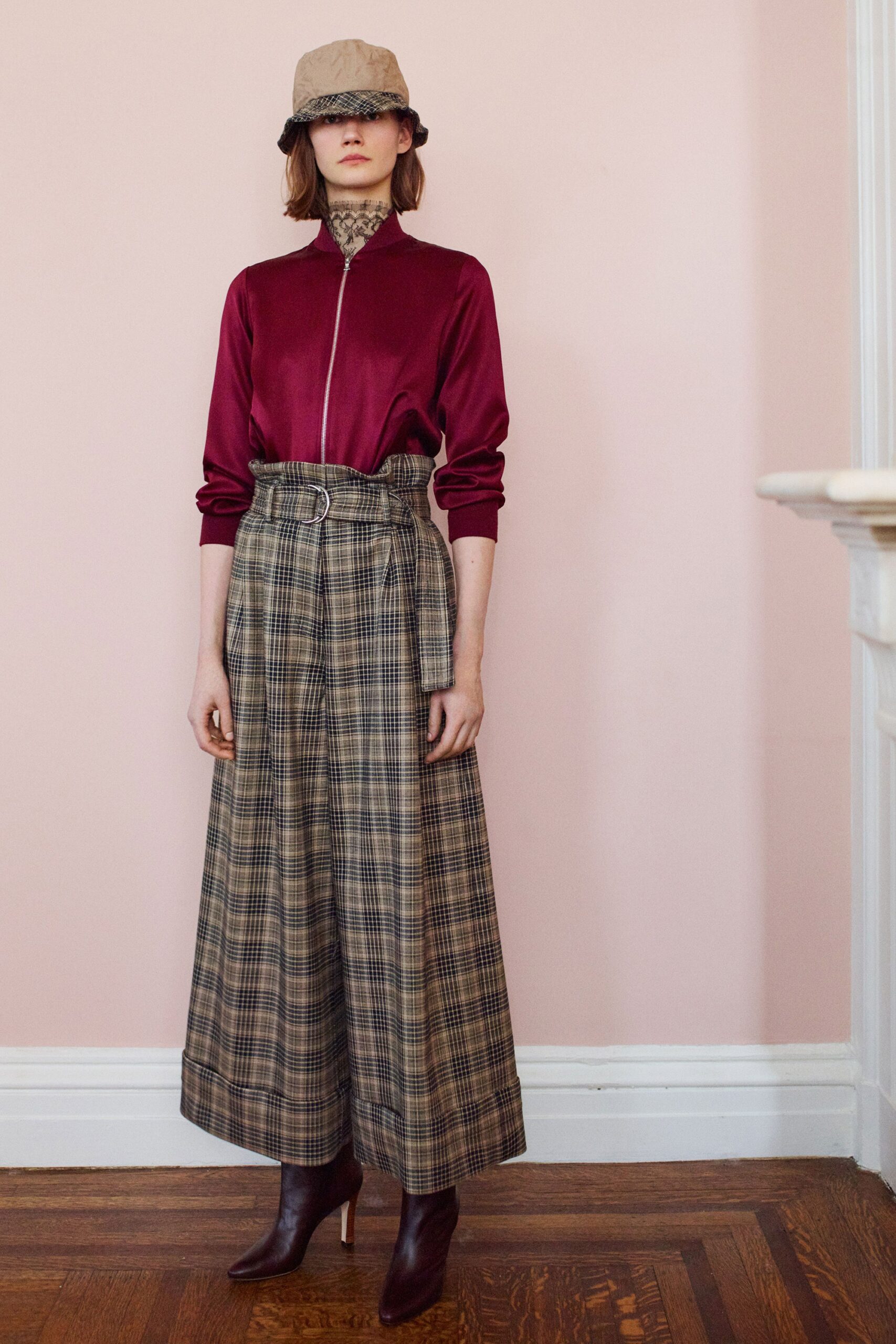 red silk shirt with beige wide-leg pants