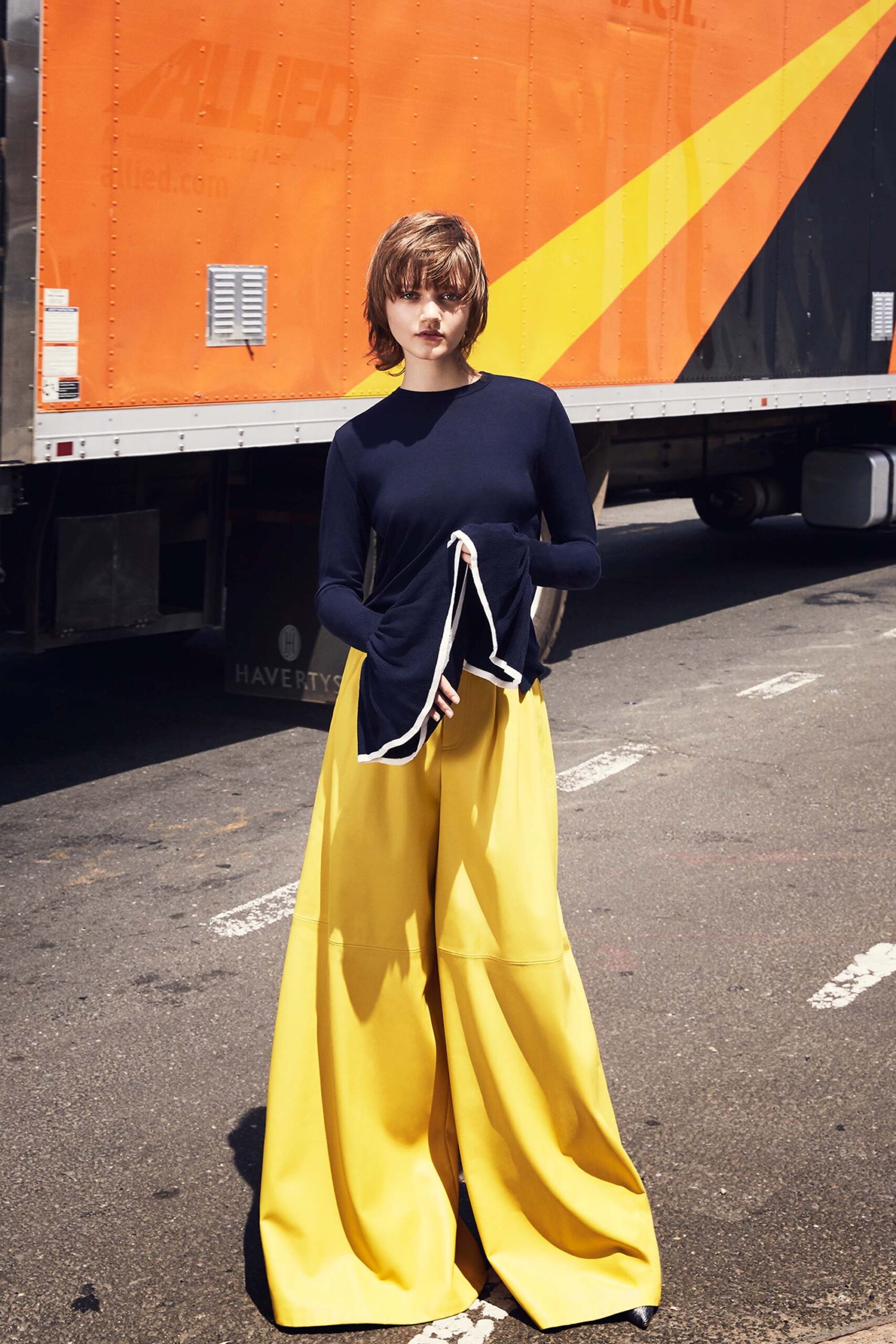 navy top and yellow wide-leg pants