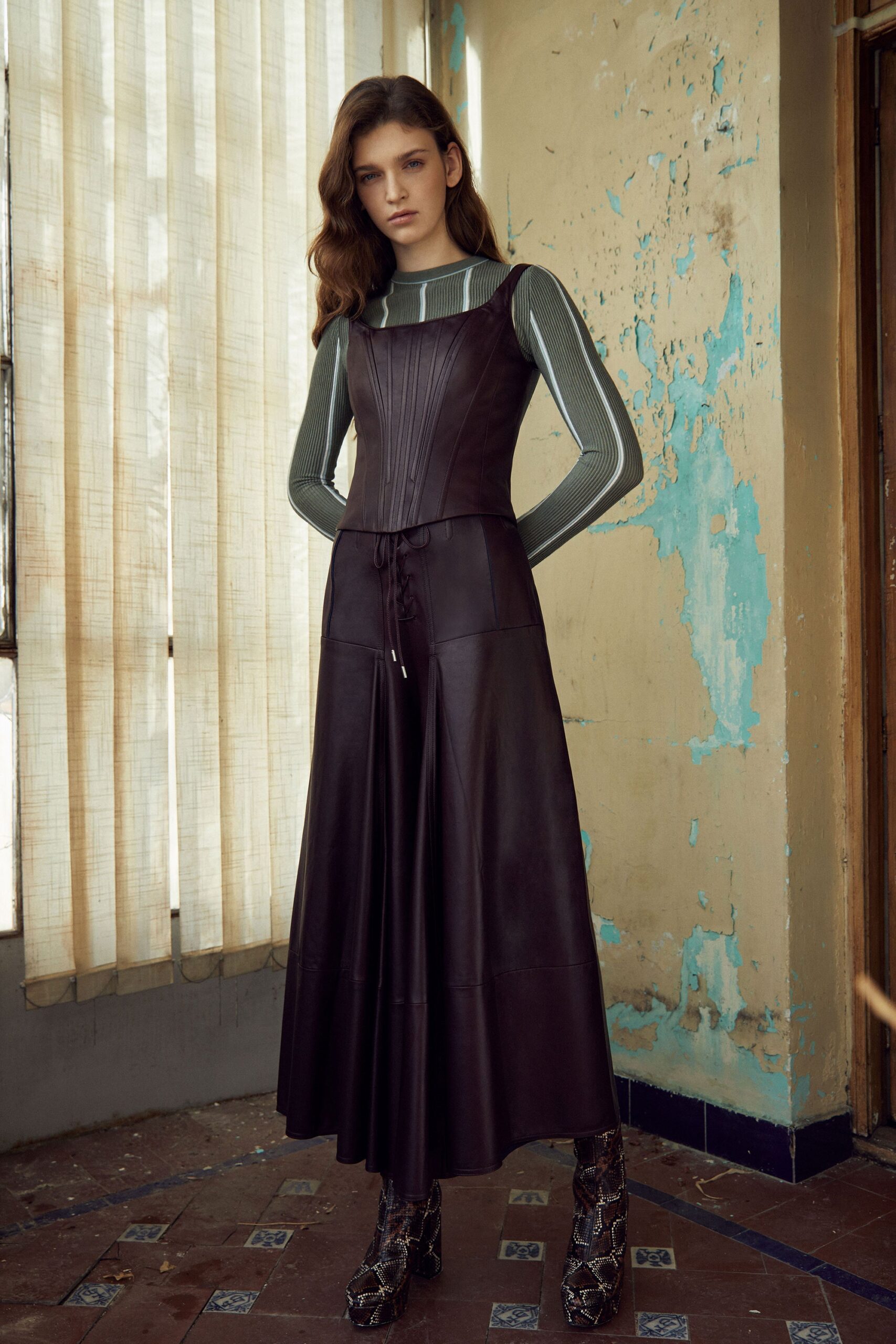 black leather midi dress and gray fitted top
