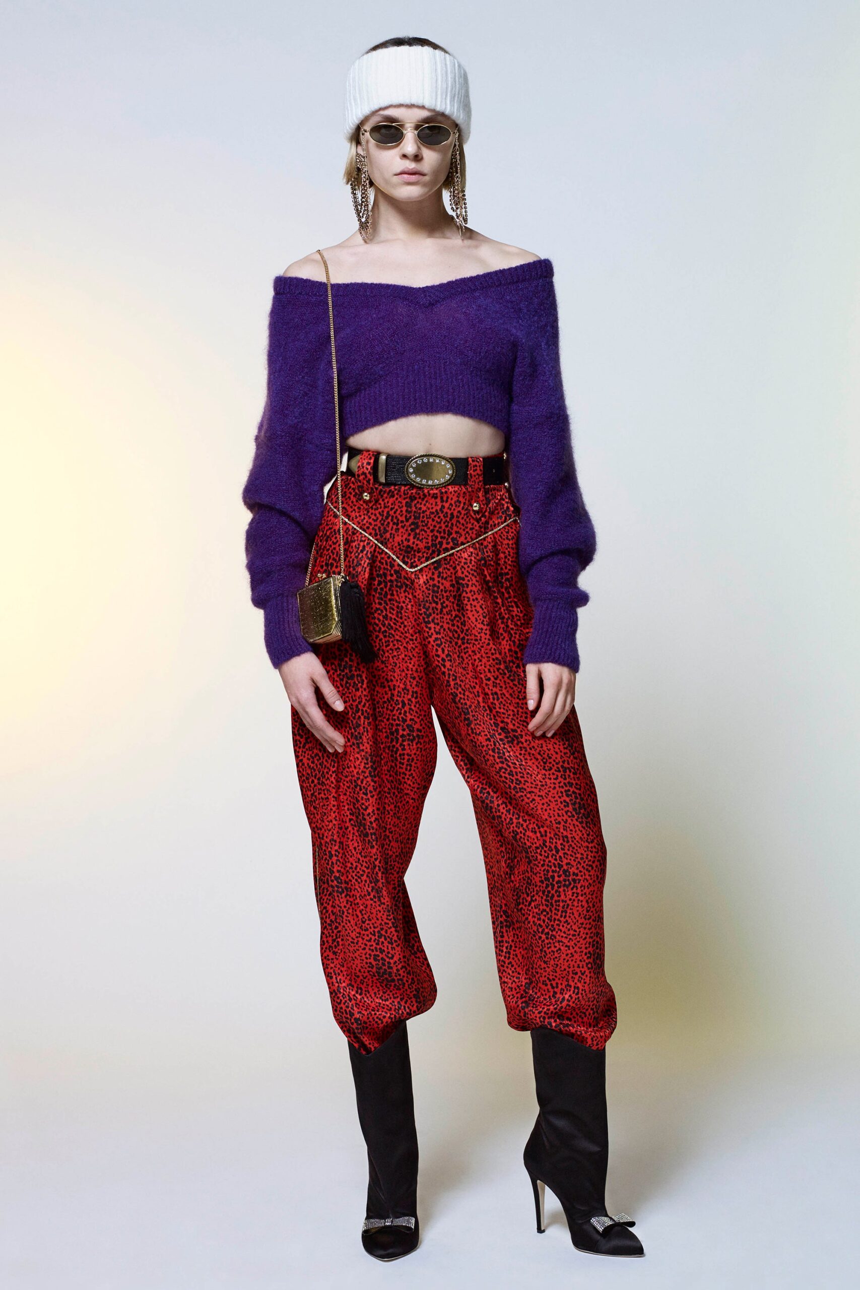 purple cropped sweater with red pants
