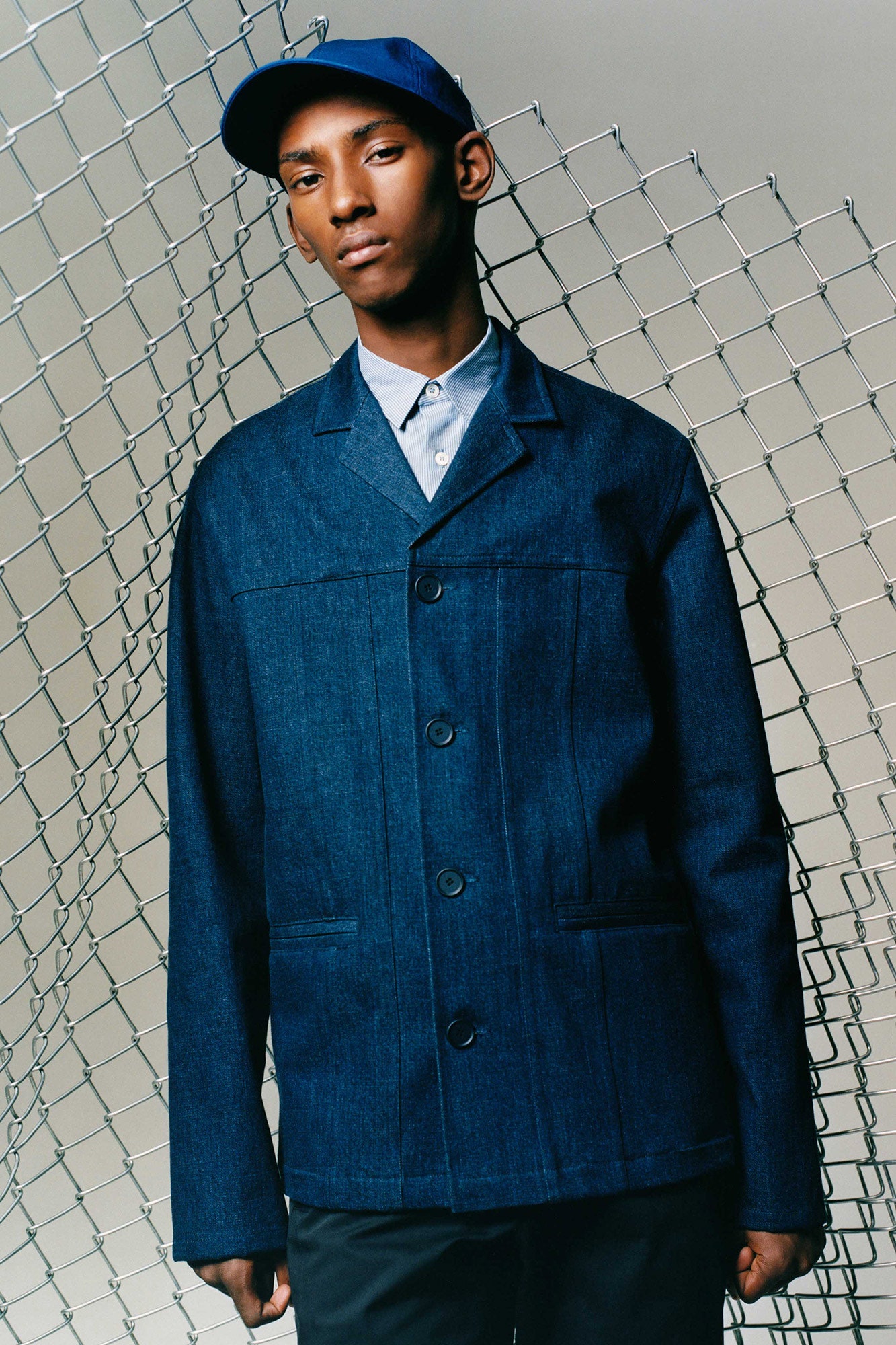 blue denim jacket with gray shirt