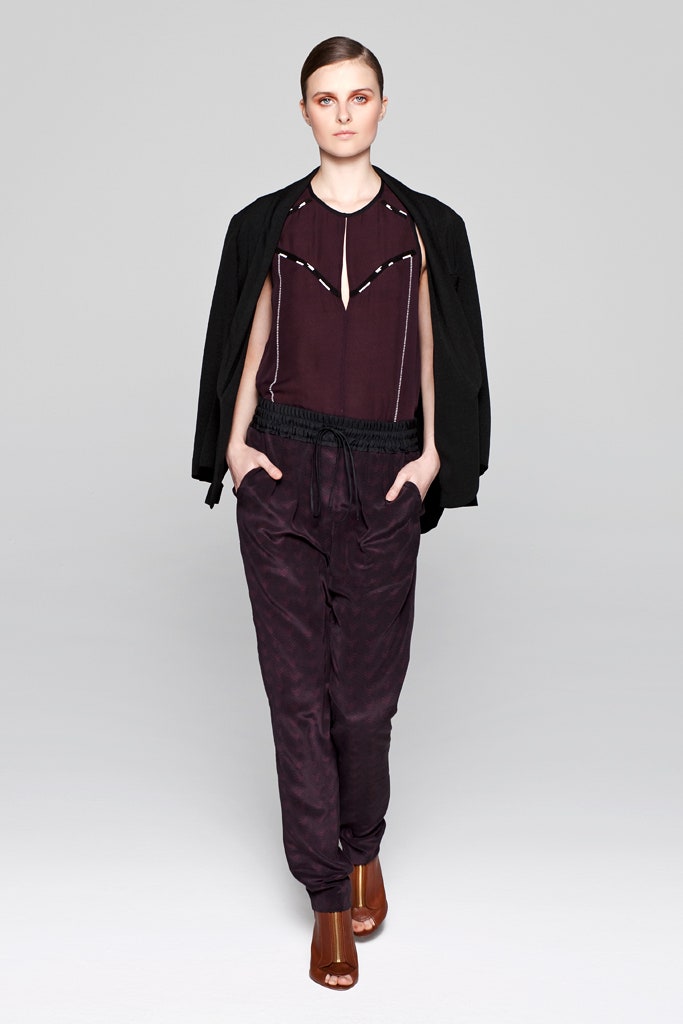 purple relaxed blouse with black pants