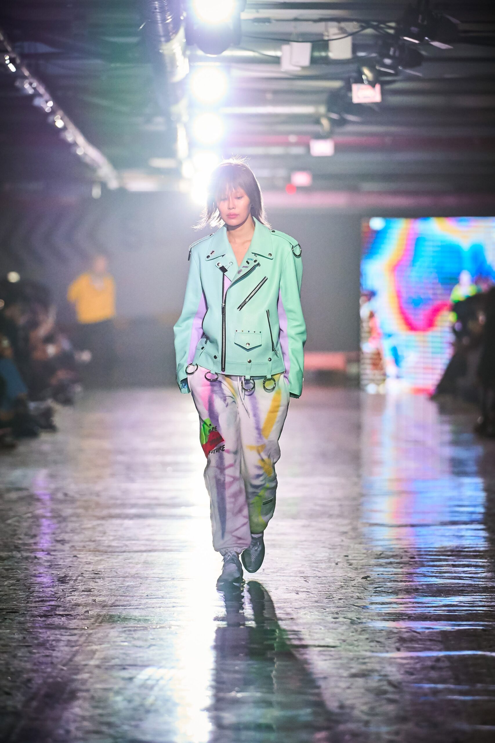 A relaxed multicolor denim jacket with a collared neckline and printed pants.
