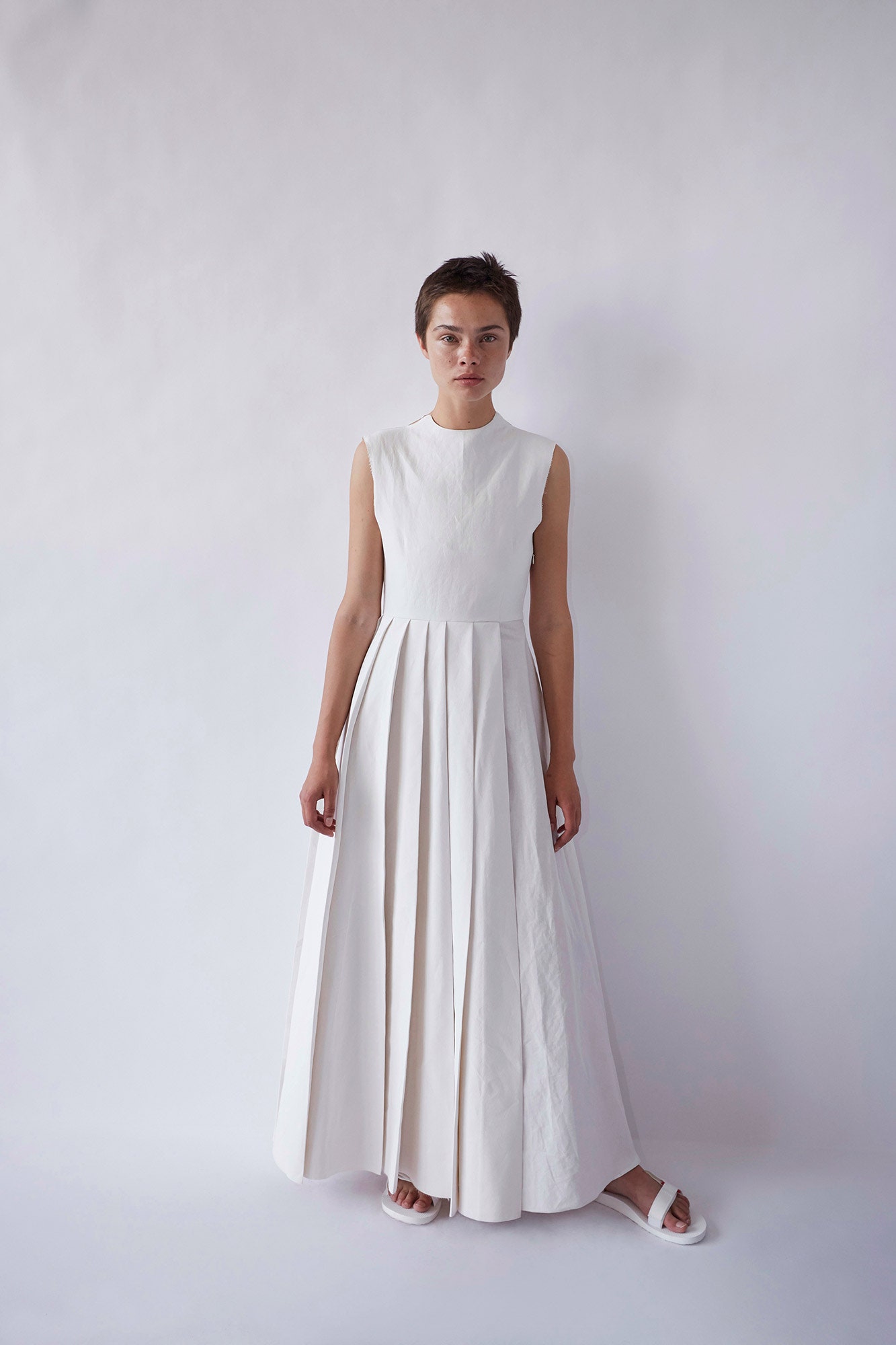 white fitted sleeveless dress