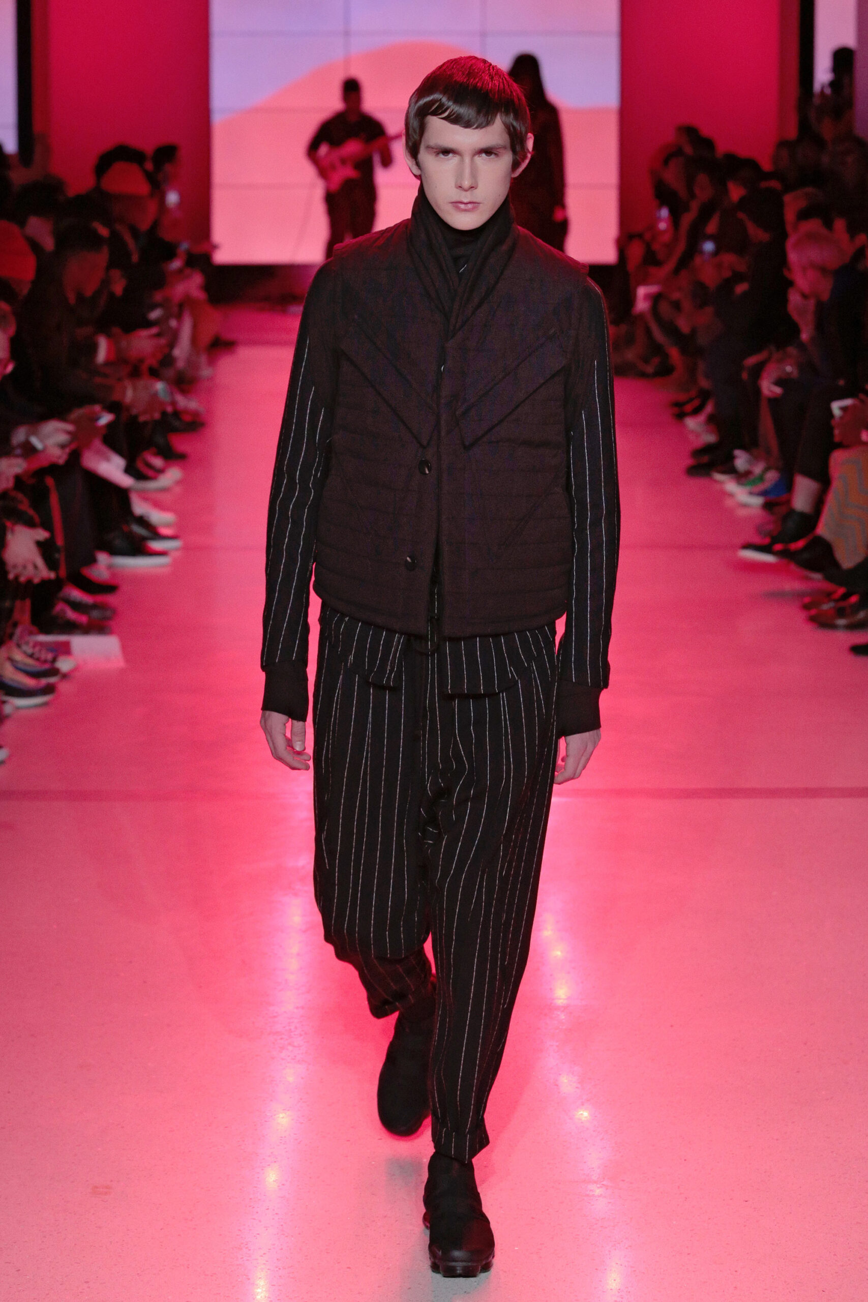 black fitted jacket and slim pants