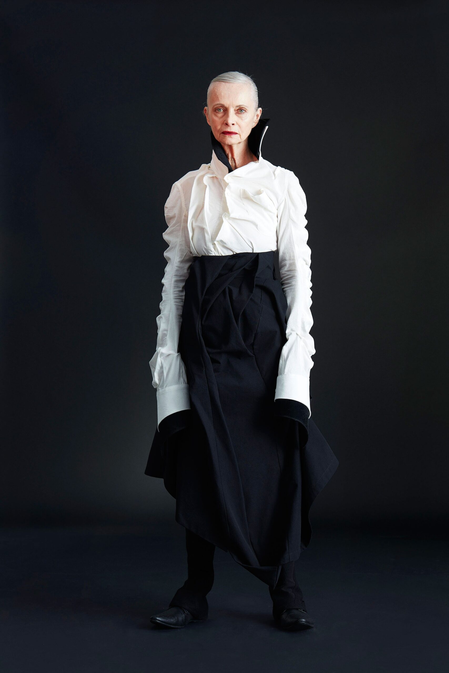 white fitted blouse with black skirt