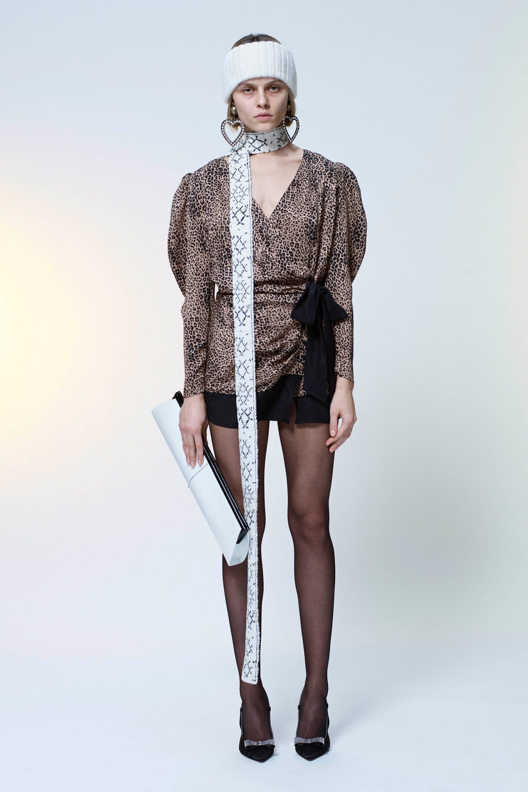 brown printed blouse with black shorts