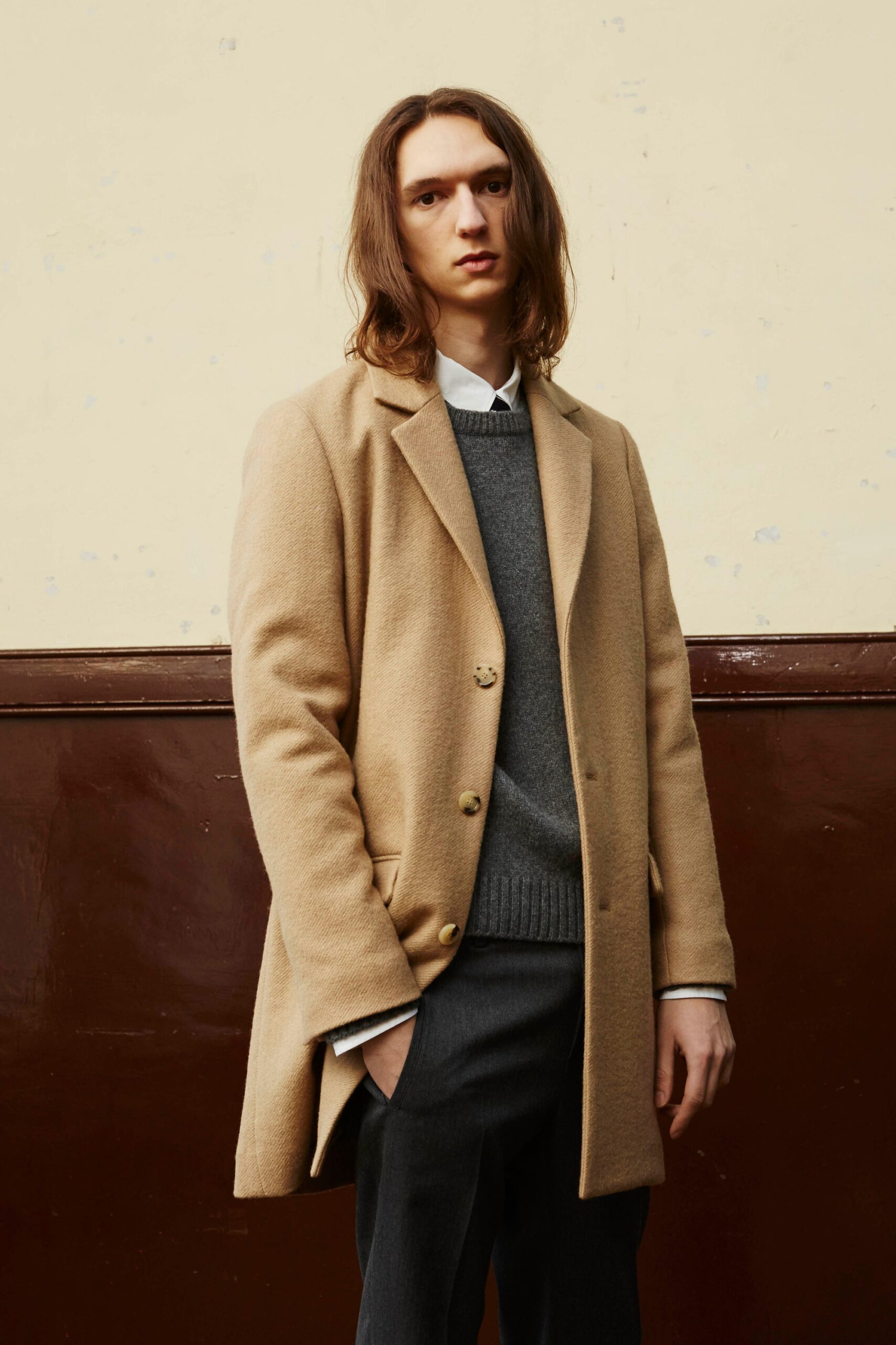 beige wool tailored coat with gray sweater