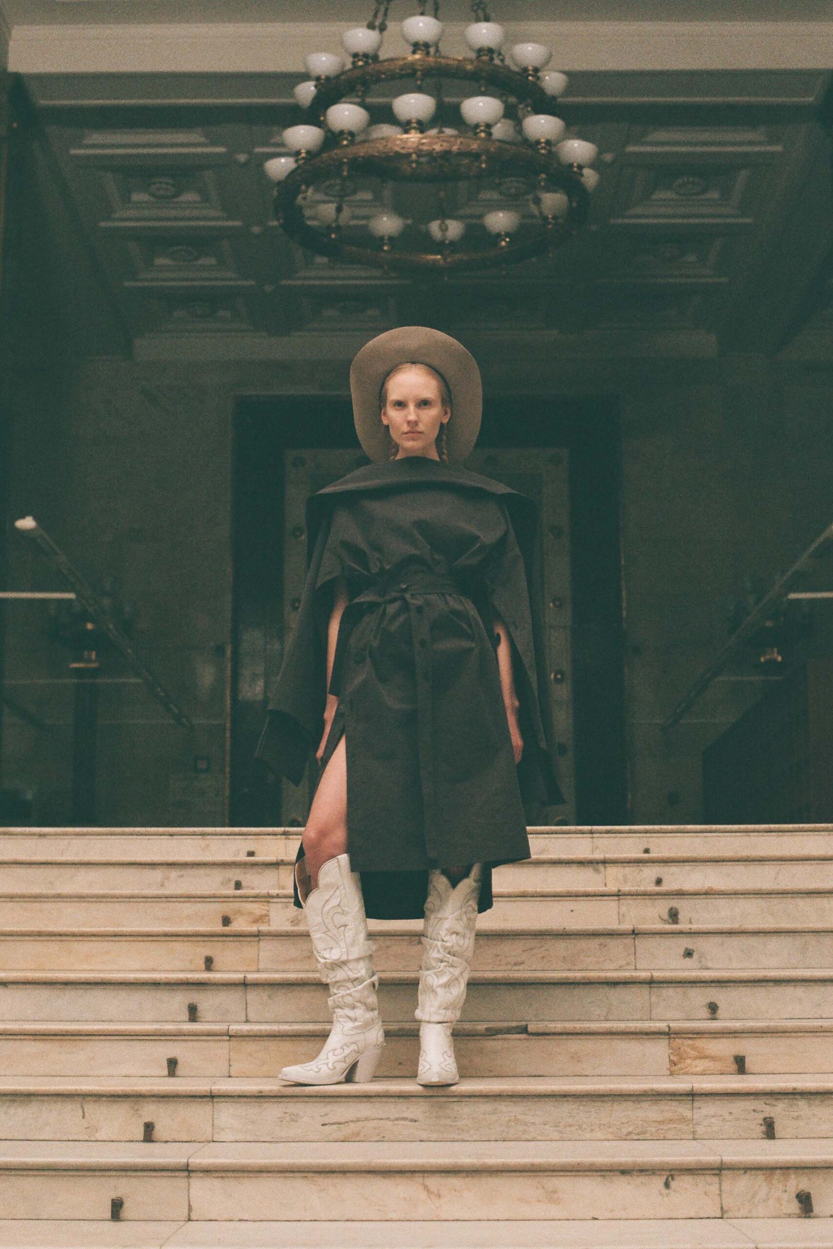 black cape white boots outfit