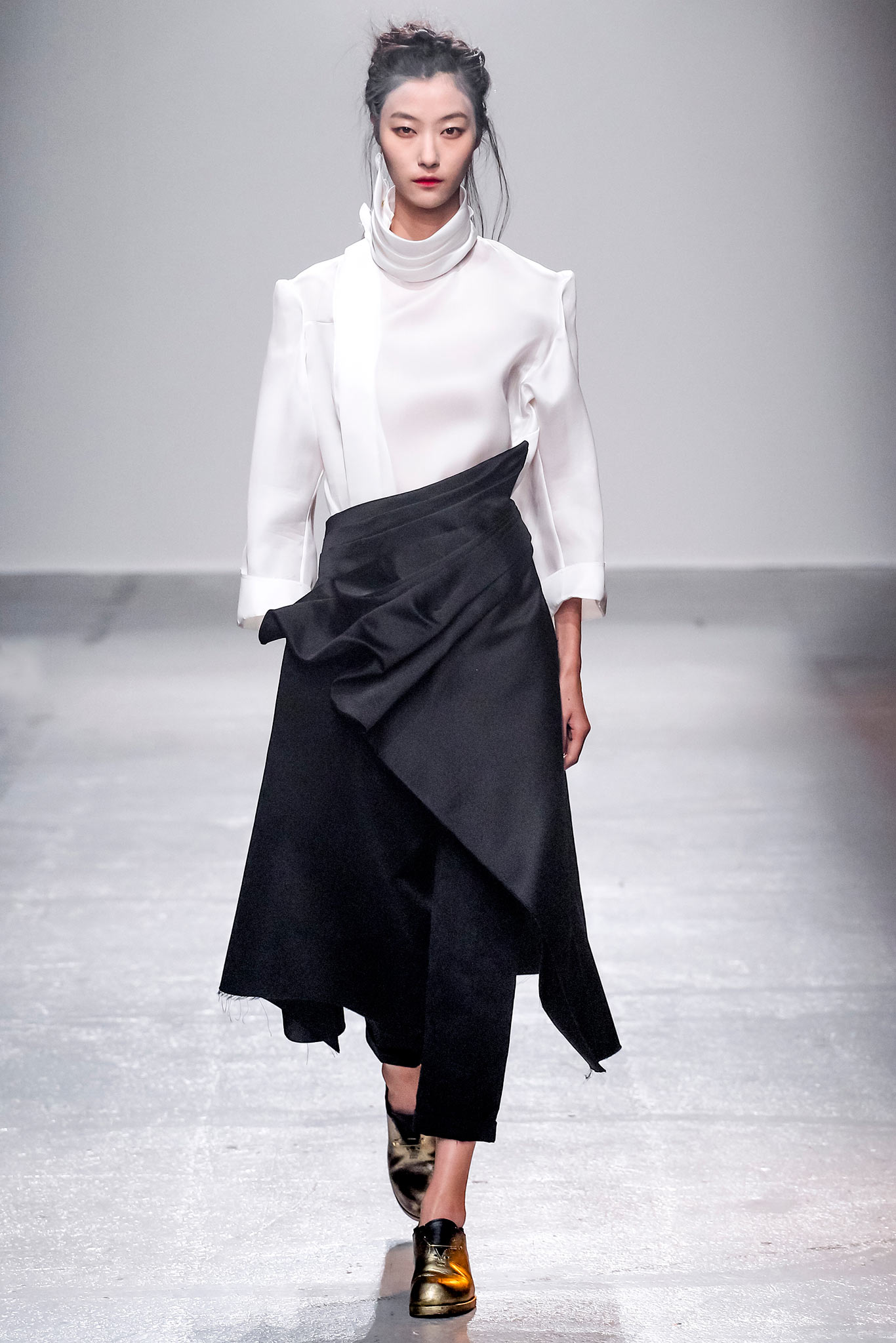 white silk blouse with asymmetric black skirt