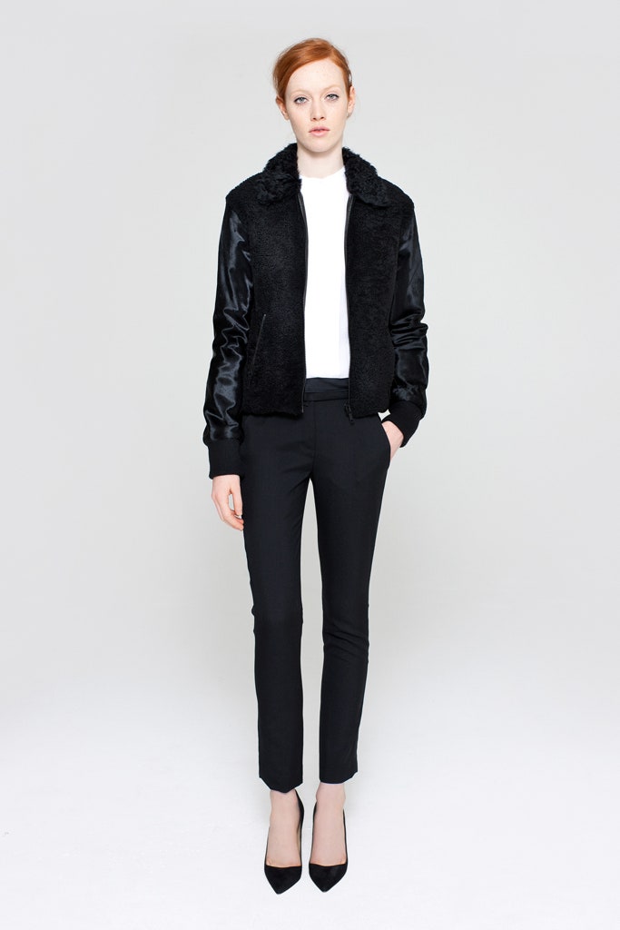 black faux-fur jacket with white shirt