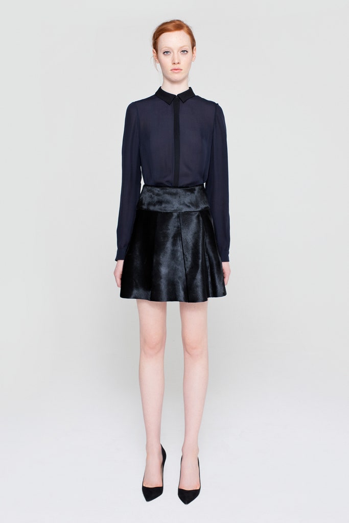 black silk blouse and leather skirt