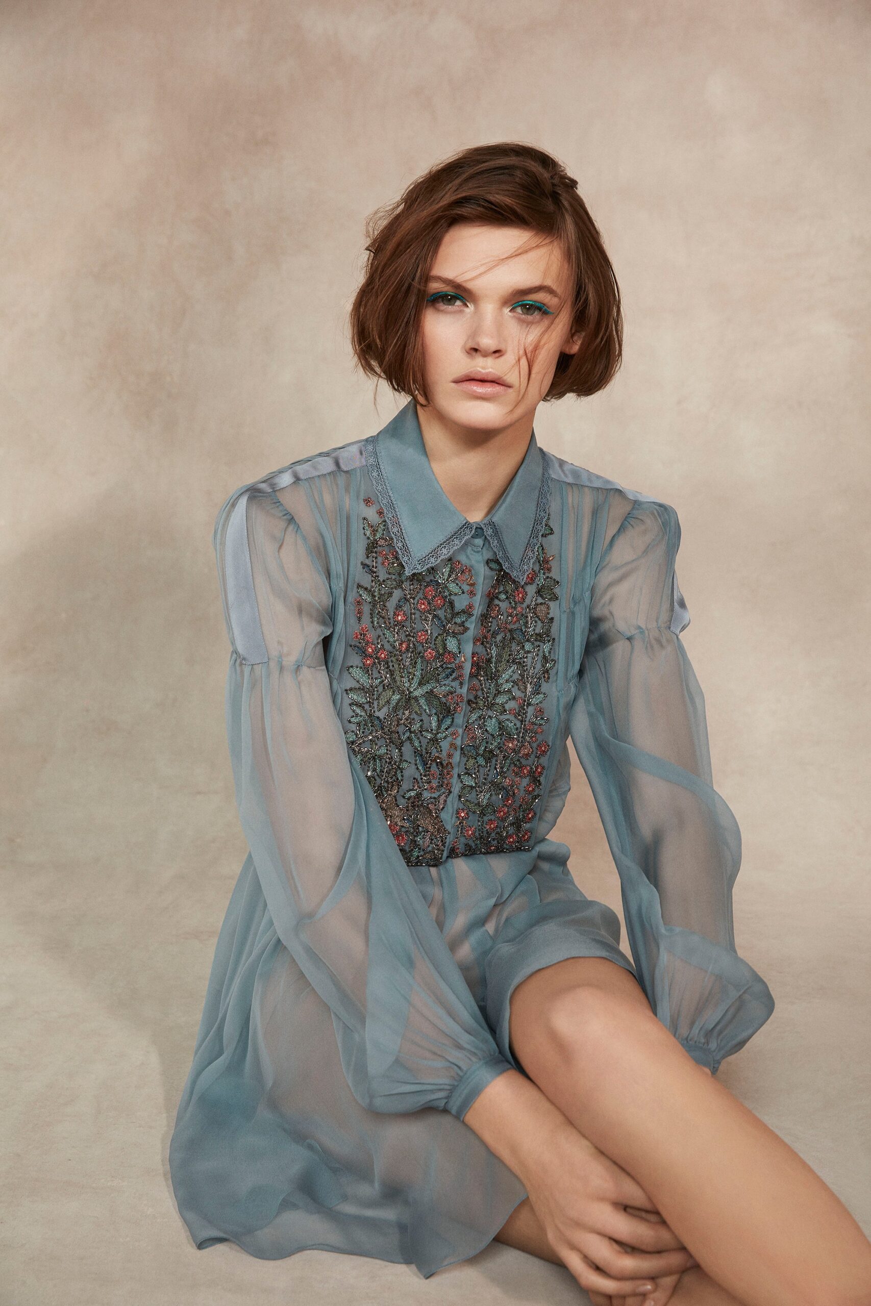 blue chiffon long-sleeve dress
