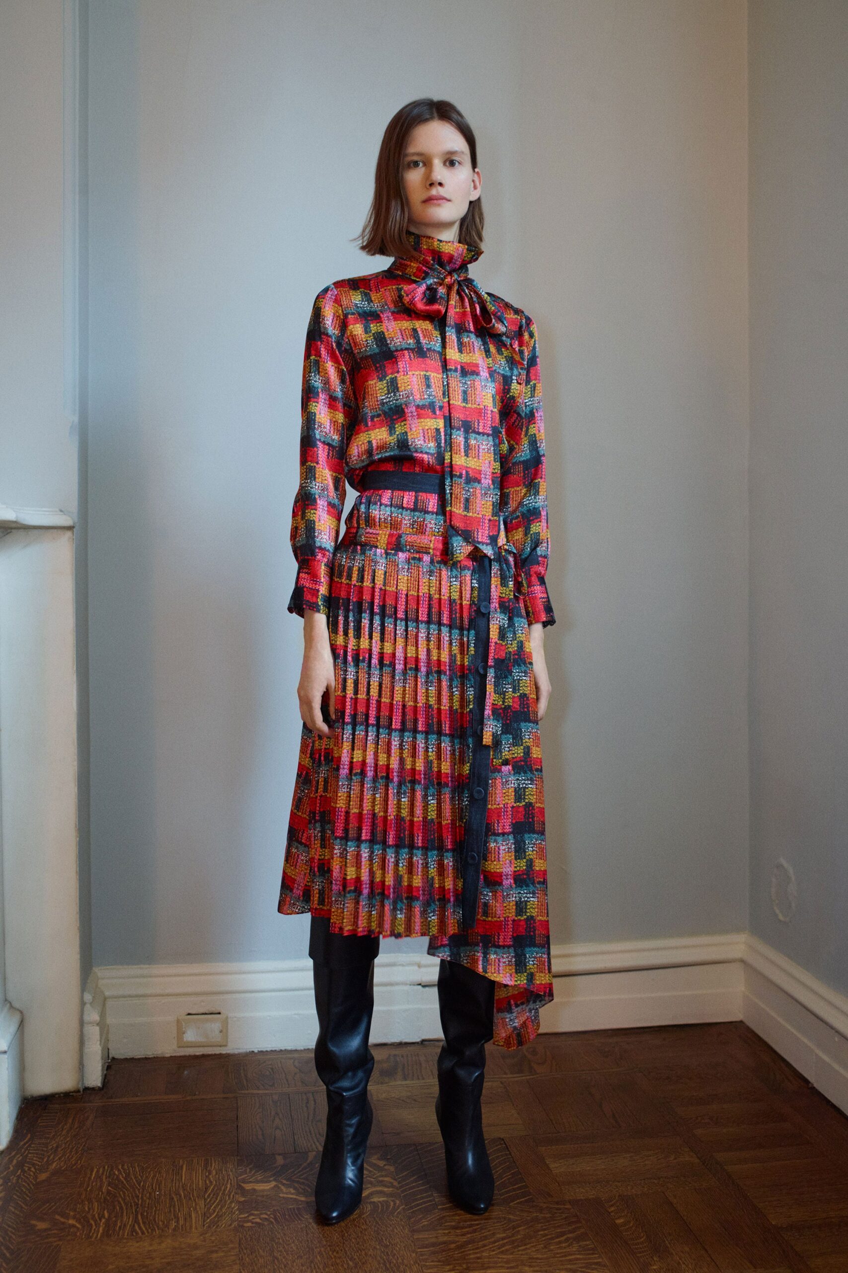 red silk long-sleeve collared fitted pleated belted dress