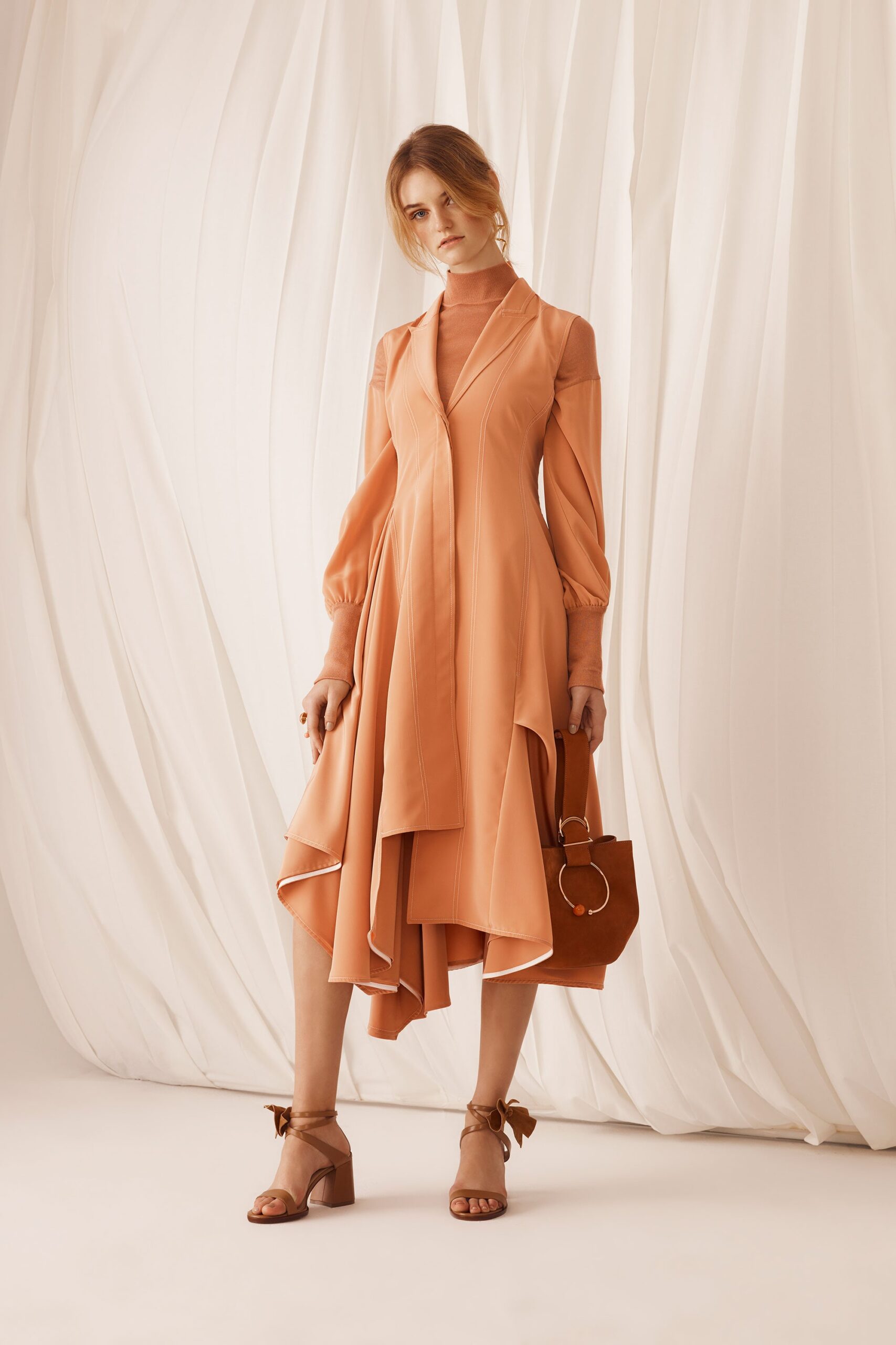 coral silk long-sleeve v-neck fitted pleated midi dress